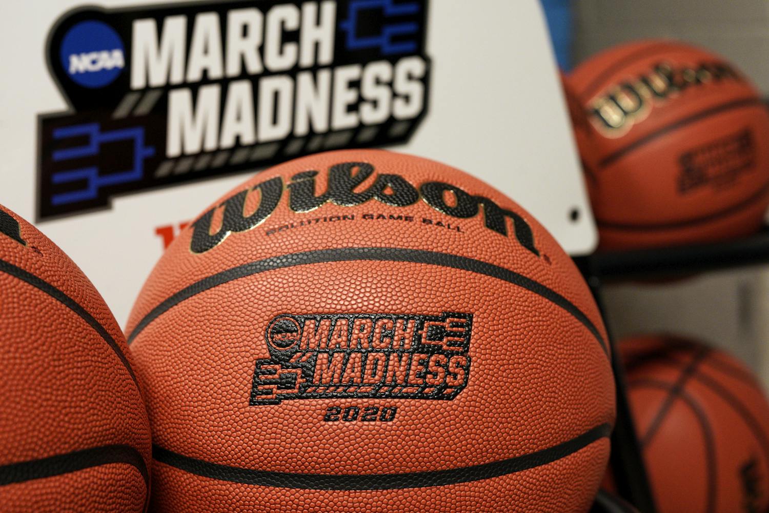 Official March Madness 2020 tournament basketballs are seen in a store room at the CHI Health Center Arena, in Omaha, Neb., Monday, March 16, 2020.