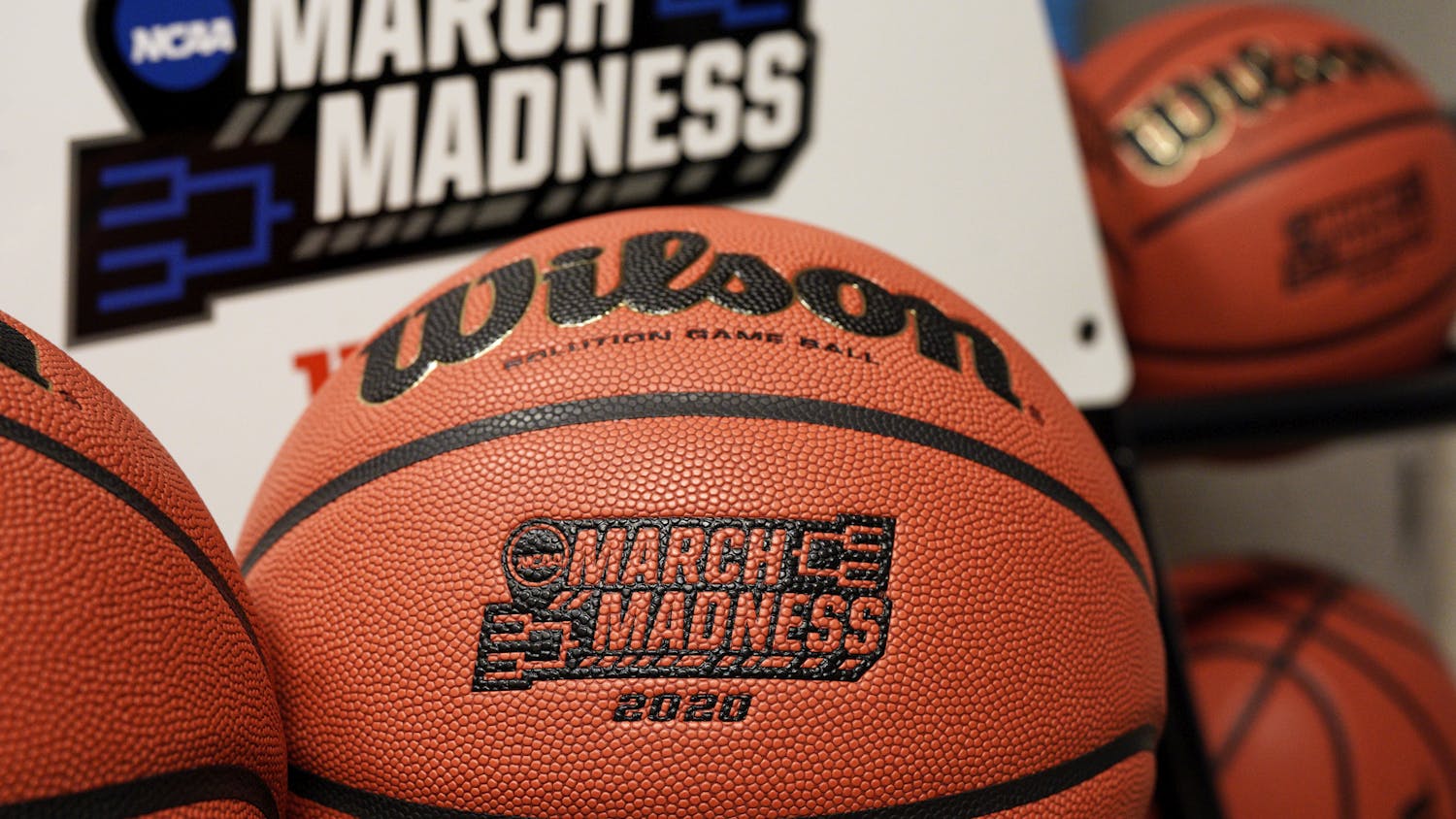 Official March Madness 2020 tournament basketballs are seen in a store room at the CHI Health Center Arena, in Omaha, Neb., Monday, March 16, 2020.