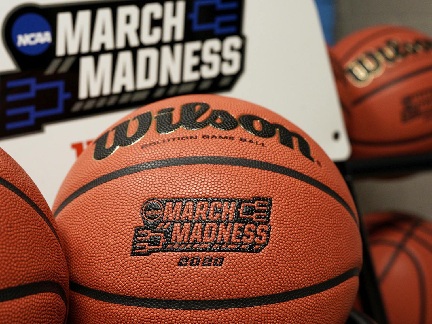 Official March Madness 2020 tournament basketballs are seen in a store room at the CHI Health Center Arena, in Omaha, Neb., Monday, March 16, 2020.