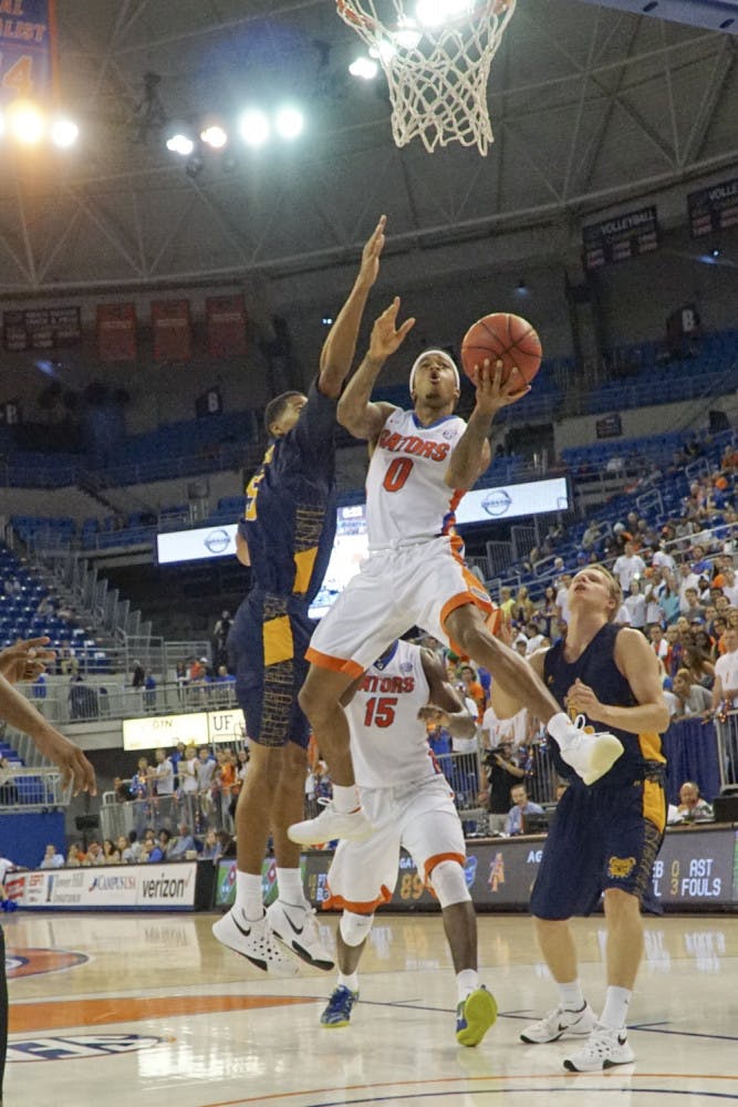 UF point guard Kasey Hill goes up for a layup during Florida's 104-54 win against North Carolina A&amp;T on Nov. 16, 2015, in the O'Connell Center.