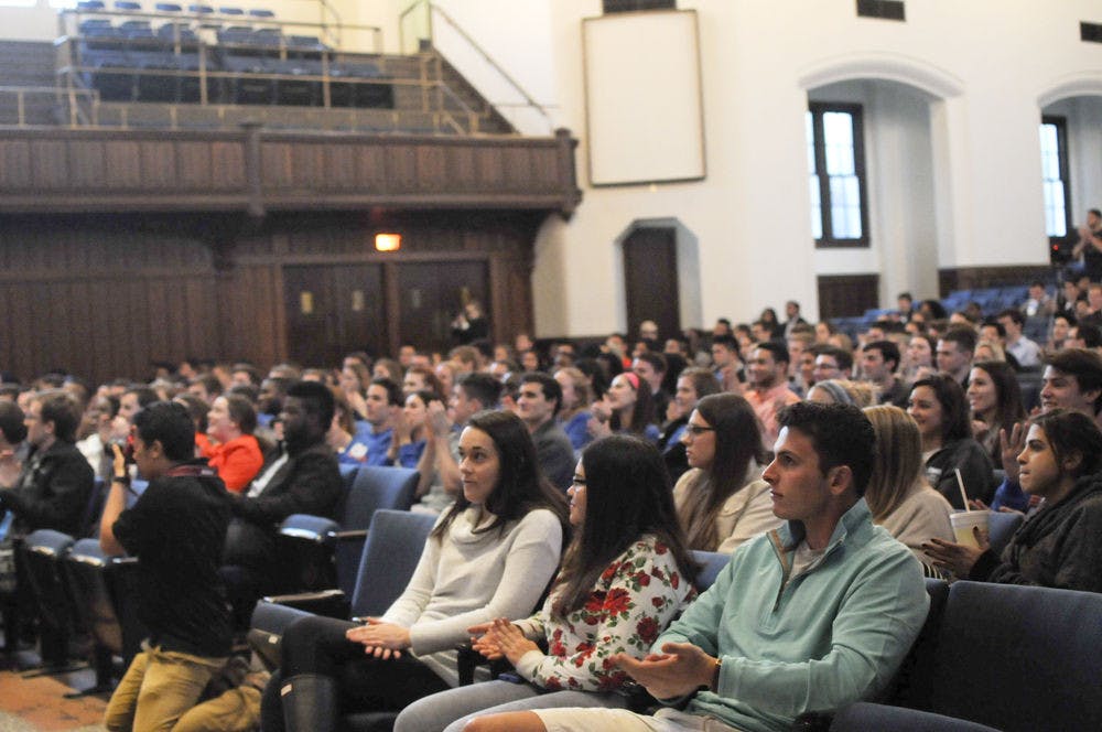 About 200 students watch and applaud as the executive ticket candidates are introduced for the Student Government debate in the University Auditorium on Monday. The debate, which lasted just more than an hour, is the only one that will occur prior to SG elections, which will take place Feb. 16 and 17.