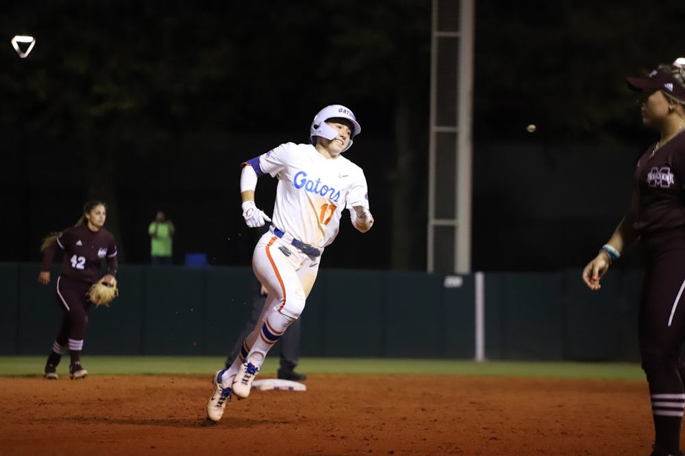 <p>Florida&#x27;s Skylar Wallace rounds the bases against Mississippi State March 14. Wallace recorded two doubles in Saturday&#x27;s Super Regional victory over Virginia Tech.</p>