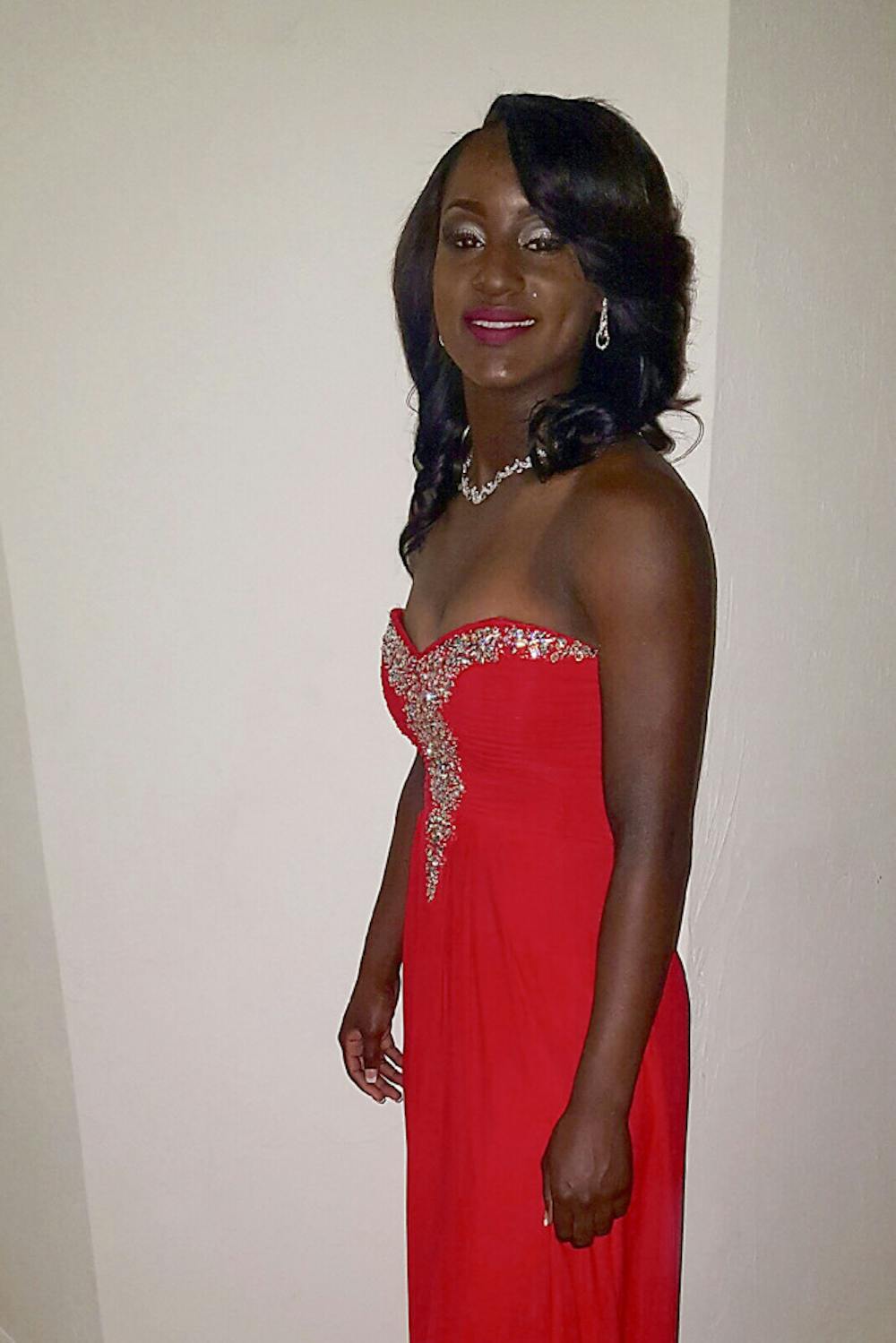 <p>Eastside High School junior Naiesha Baker poses for a photo with the outfit she won from the Being Fab for Prom giveaway, which was started by UF alumnae Gabrielle Burch and Brooke Cantrell. “At first I thought it was fake that I had won. I had to ask my mom if this was for real,” she said.</p>