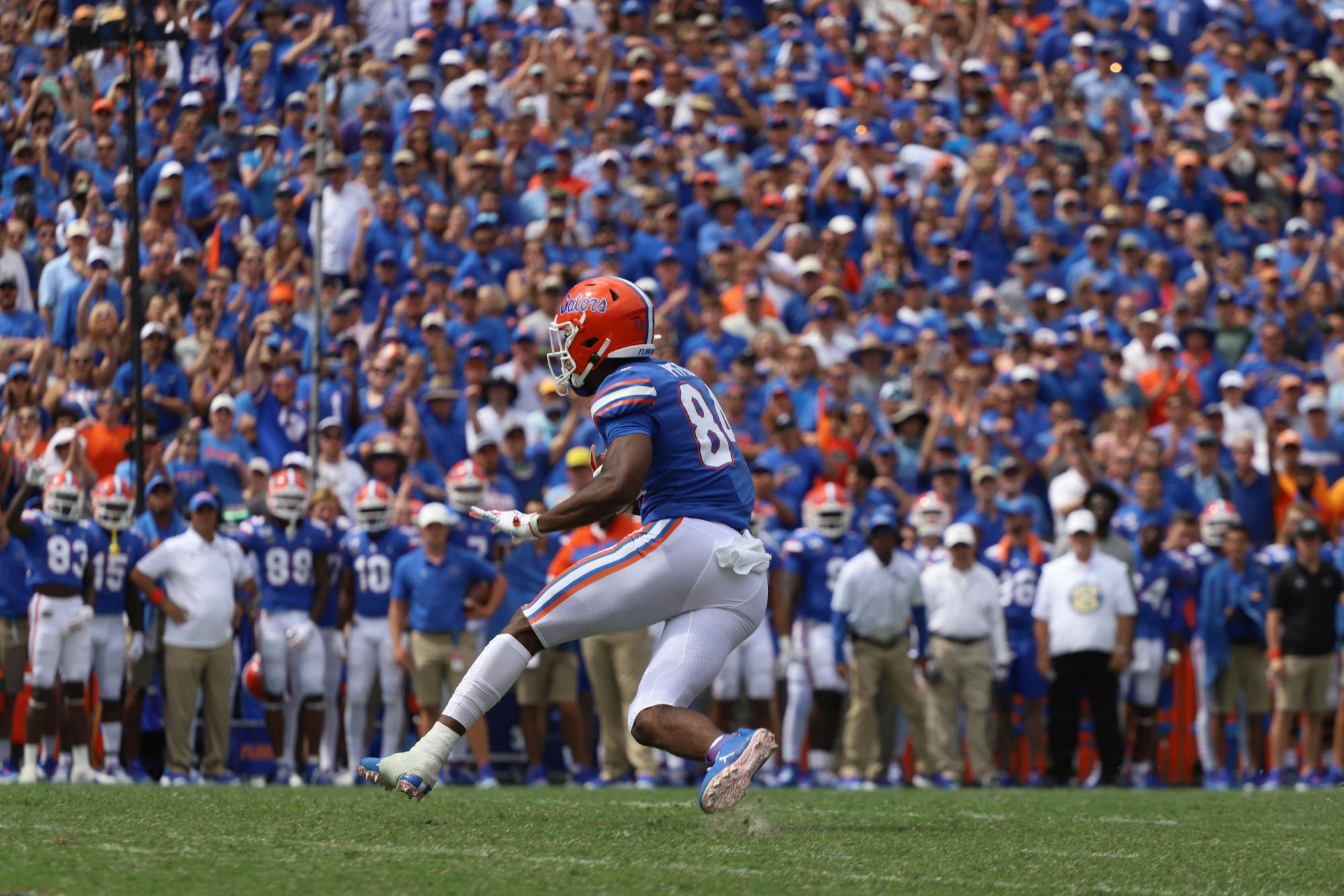 Pitts is in the running against Ole Miss wide receiver Elijah Moore and Alabama wide receiver DeVonta Smith. Photo from UF-Tennessee game in September 2019.
