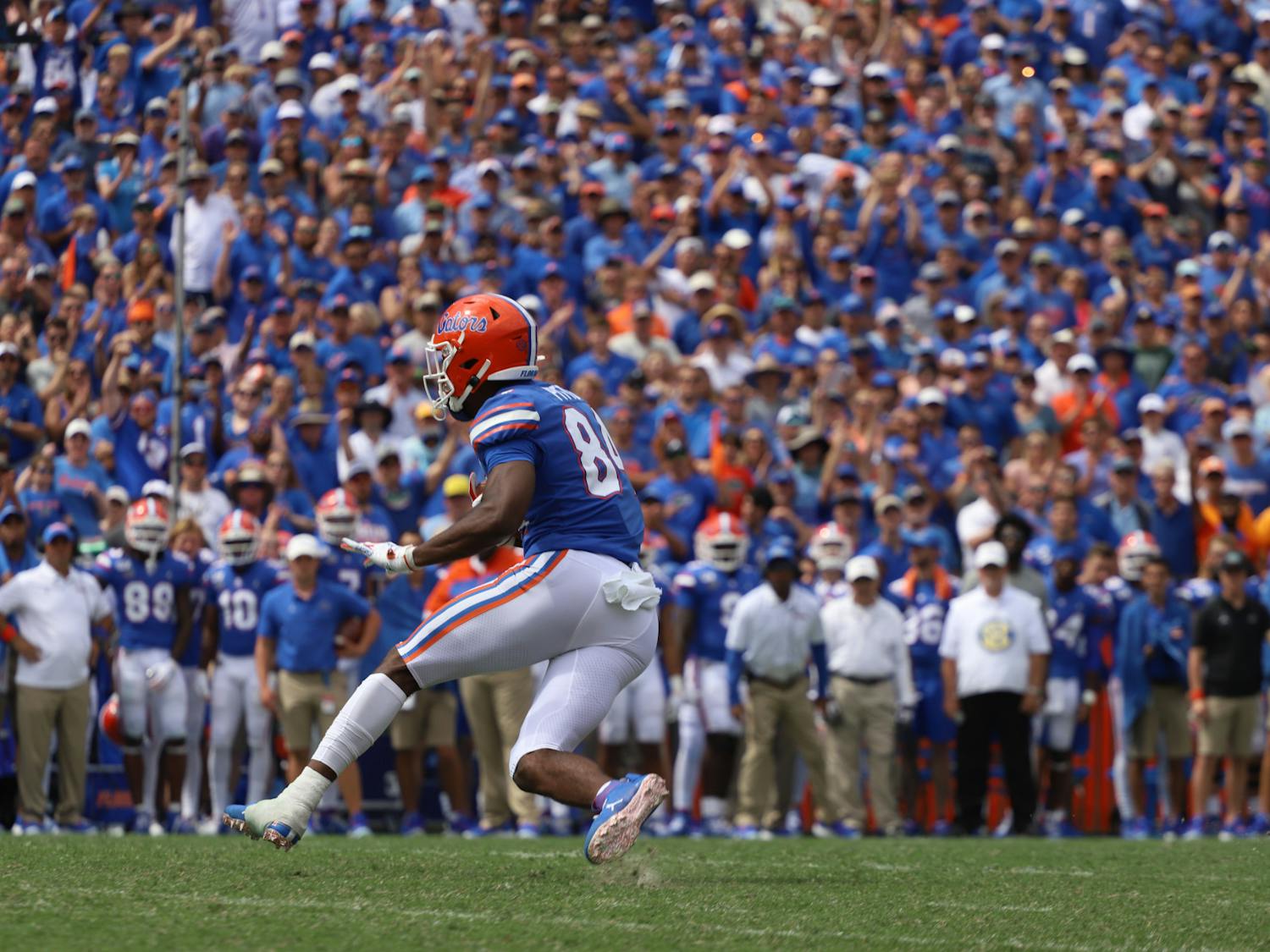 Pitts is in the running against Ole Miss wide receiver Elijah Moore and Alabama wide receiver DeVonta Smith. Photo from UF-Tennessee game in September 2019.