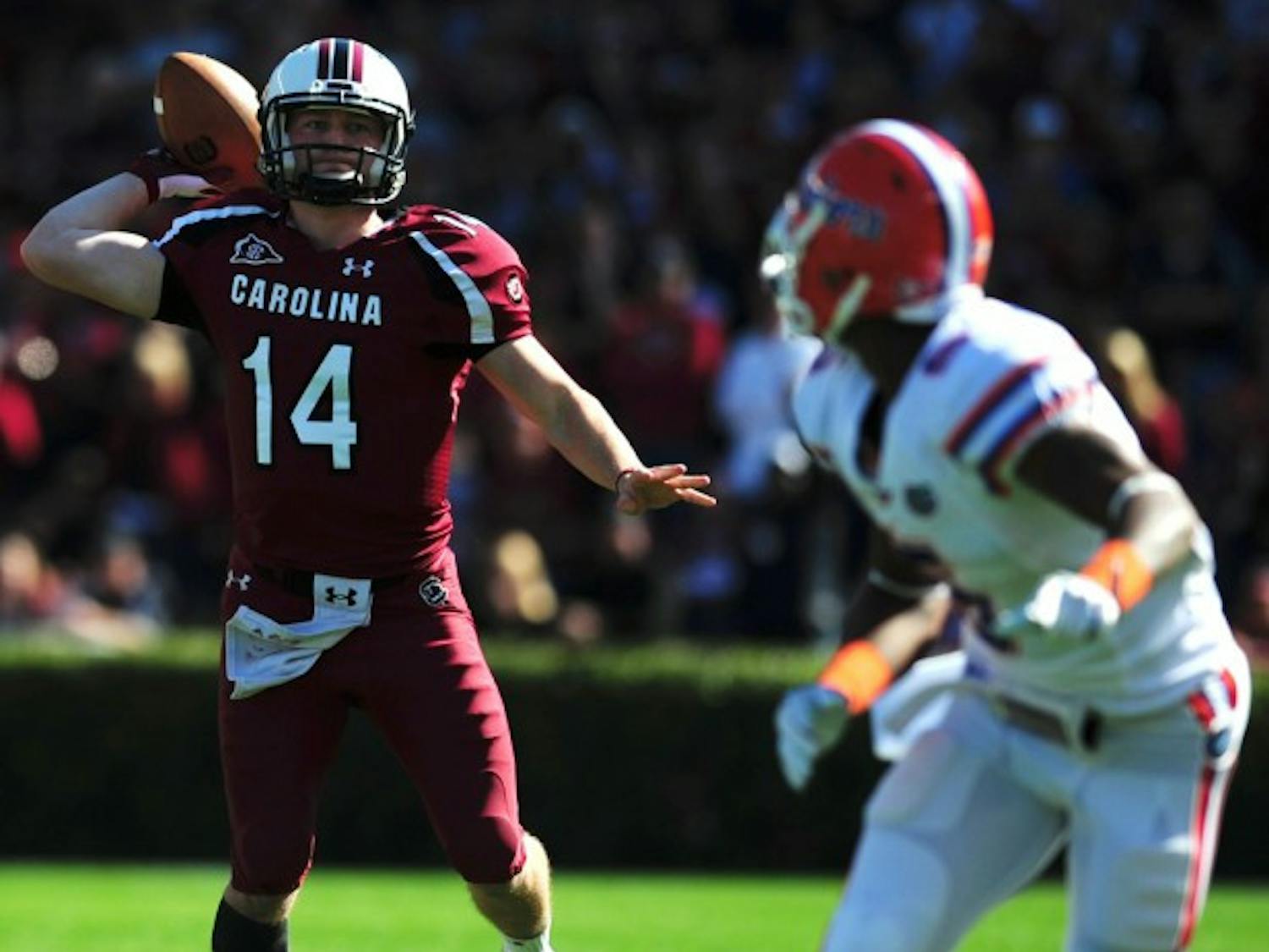 South Carolina quarterback Connor Shaw throws against Florida in a 17-12 win Nov. 12. Shaw threw 14 touchdown passes and ran for eight last season.