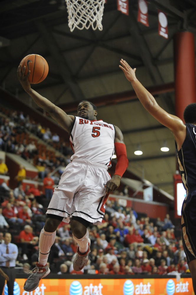 Former Rutgers guard Eli Carter attempts a layup during a 68-65 victory against George Washington University on Dec. 11, 2012.