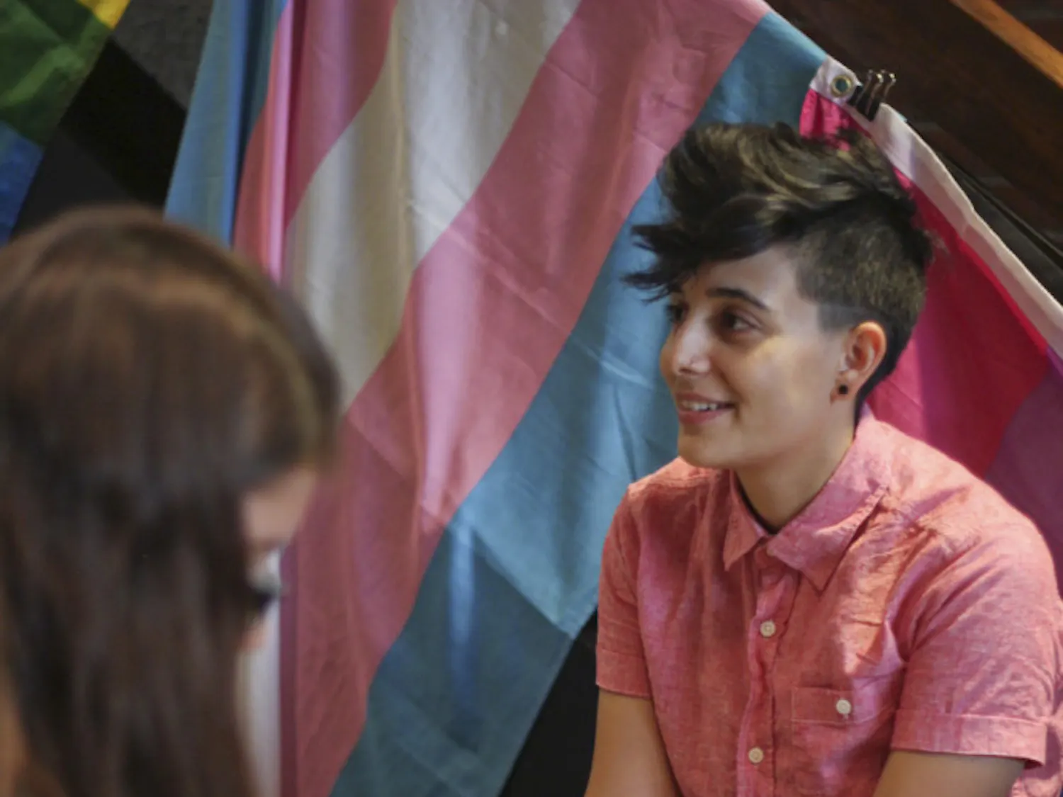 Gabrielle Ricci, a 22-year-old UF psychology student, works the Wild Iris booth at the LGBTQ+ Welcome Assembly on Sept. 3, 2015. The assembly invited new students to be welcomed to the Gator Nation and learn about sexual orientation, gender identity and gender expression.