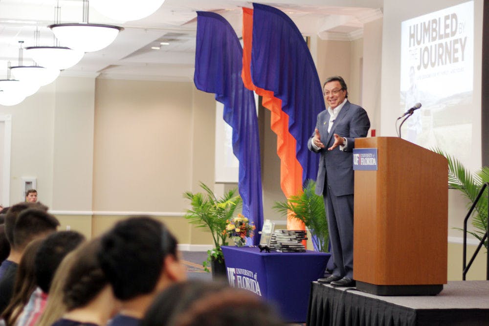 Cuban entrepreneur and author Miguel Fernandez speaks to an audience of about 150 in Emerson Hall on Tuesday. He spoke about his life, gave advice and signed copies of his book "Humbled by the Journey."