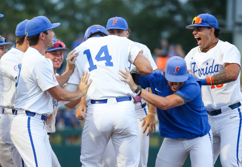 Florida sophomore two-way player Jac Caglianone celebrates with his teammates during the Gators' 10-0 win against Vanderbilt Friday, May 12, 2023. 