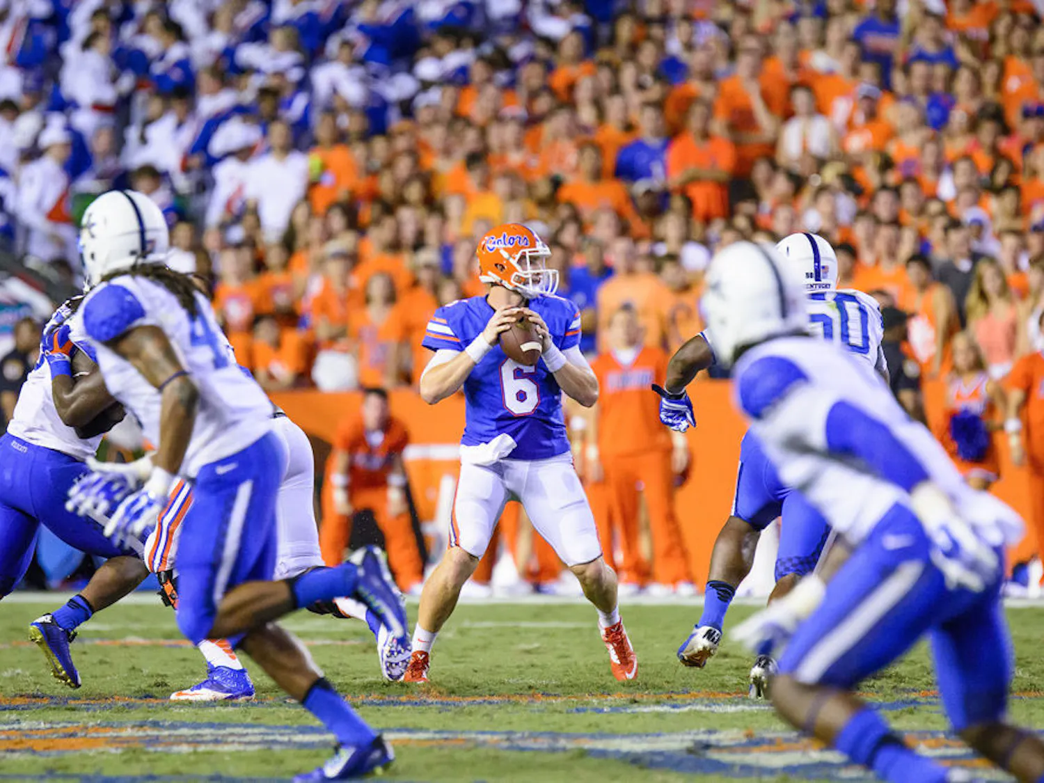 UF quarterback Jeff Driskel drops back in the pocket to attempt a pass during Florida's 36-30 triple-overtime win against Kentucky on Saturday at Ben Hill Griffin Stadium.