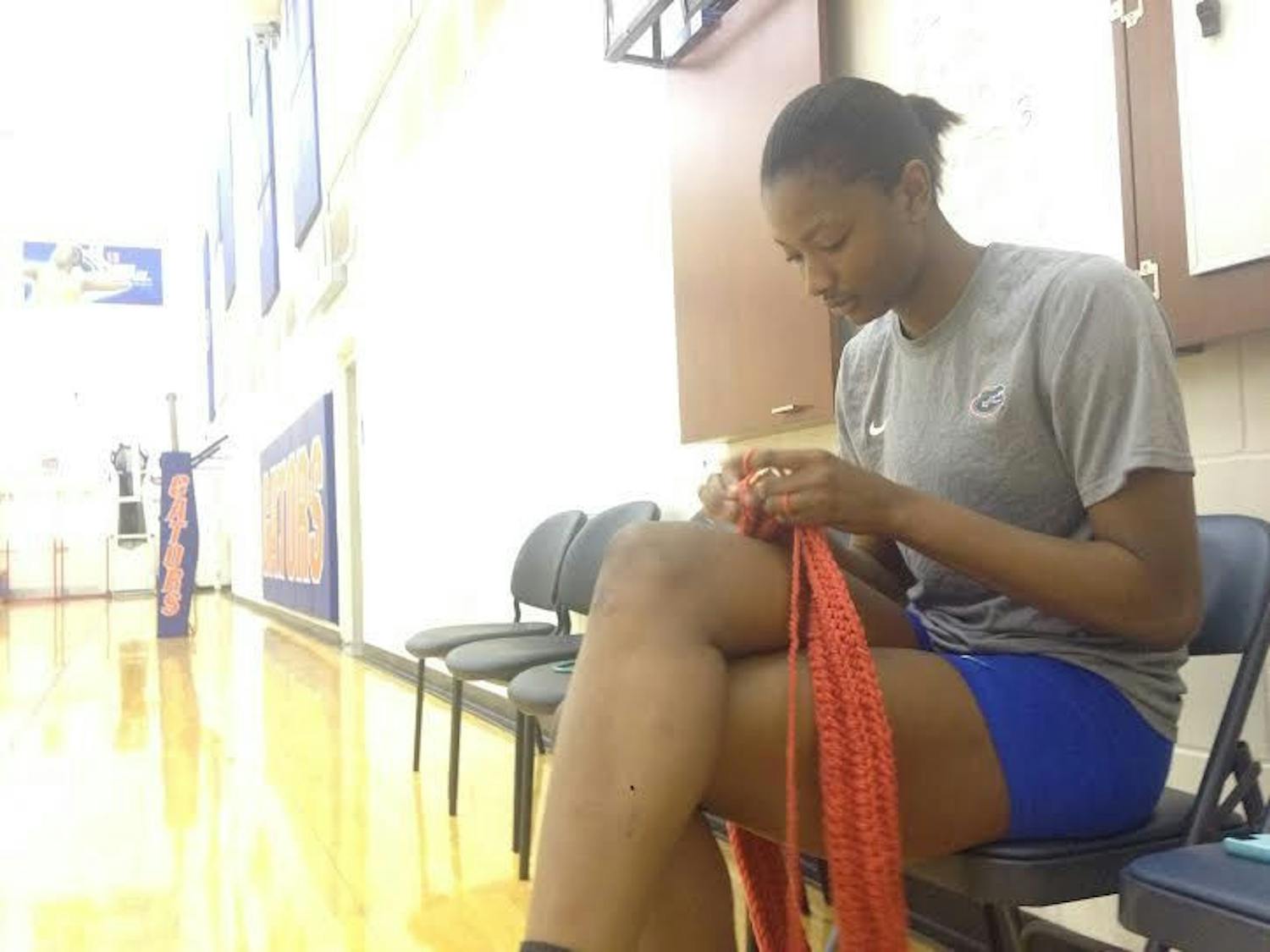 UF middle blocker Rhamat Alhassan knits before practice on Oct. 21, 2015,&nbsp;in the Lemerand Practice Facility.