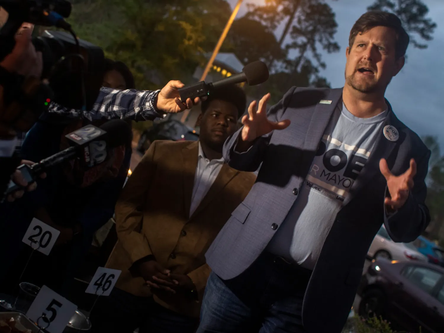 Lauren Poe speaks to a crowd of reporters and about 100 supporters March 20, 2019 at the Public and General restaurant after elections. Poe beat three opponents to win his second term as mayor of Gainesville.