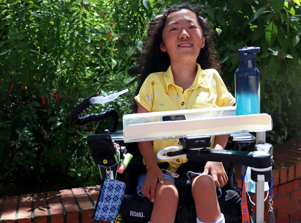 <p>Molly Wagner, 19, UF psychology and Chinese freshman, poses for a portrait outside of Anderson Hall. Wagner, who has muscular dystrophy, said she’s spent the past few weeks acclimating to life on campus.</p>