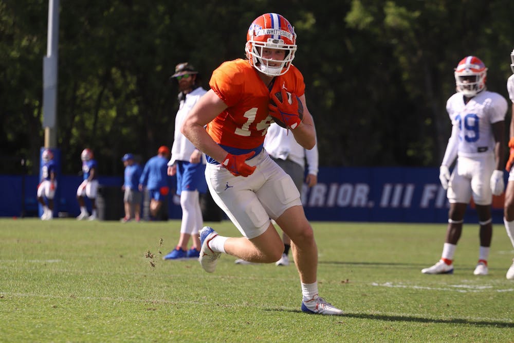 <p>Wide receiver Trent Whittemore runs with the ball March 29, 2022. Whittemore announced he will enter the transfer portal as a graduate student Monday night. </p>