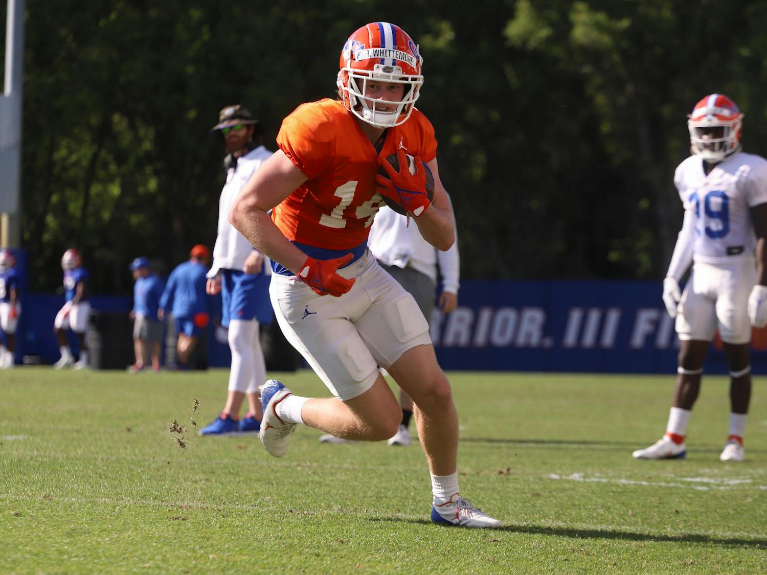 Wide receiver Trent Whittemore runs with the ball March 29, 2022. Whittemore announced he will enter the transfer portal as a graduate student Monday night.