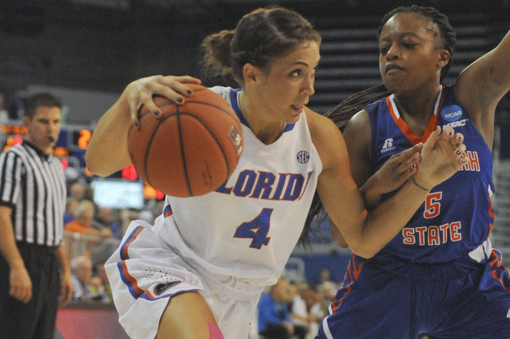UF point guard Carlie Needles drives to the basket during Florida's 99-34 win over Savannah State on Nov. 24, 2015, in the O'Connell Center.