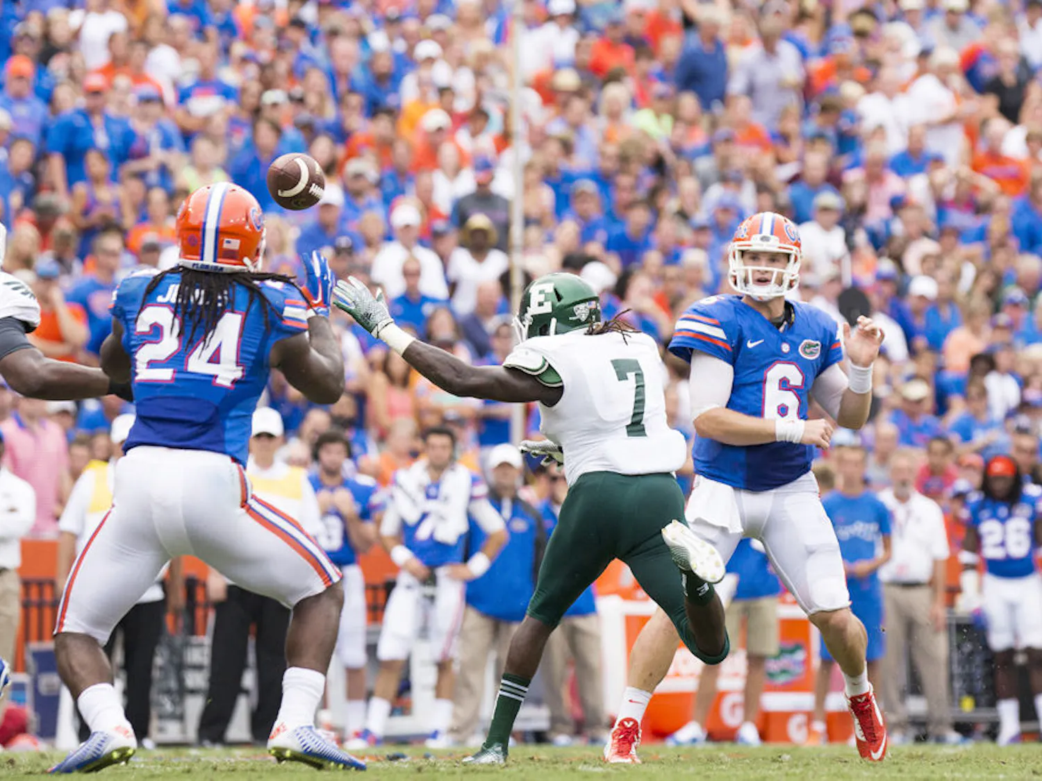 Jeff Driskel (6) passes to Matt Jones (24) during Florida's 65-0 win against Eastern Michigan on Saturday at Ben Hill Griffin Stadium.