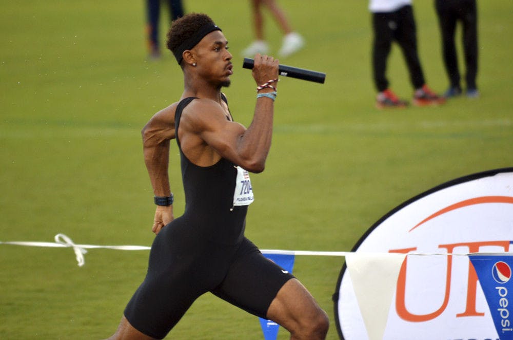 <p>UF’s Najee Glass races the final leg of the 4x400-meter relay to close out the 2015 Florida Relays on April 4, 2015, at the Percy Beard Track.</p>