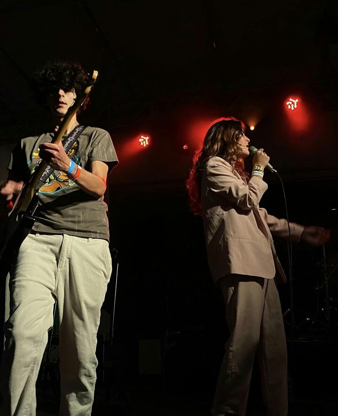 Quail Hollow members Ashley Griffith and Dominic Fonseca performing at the Heartwood Soundstage on Friday, March 24, 2023.