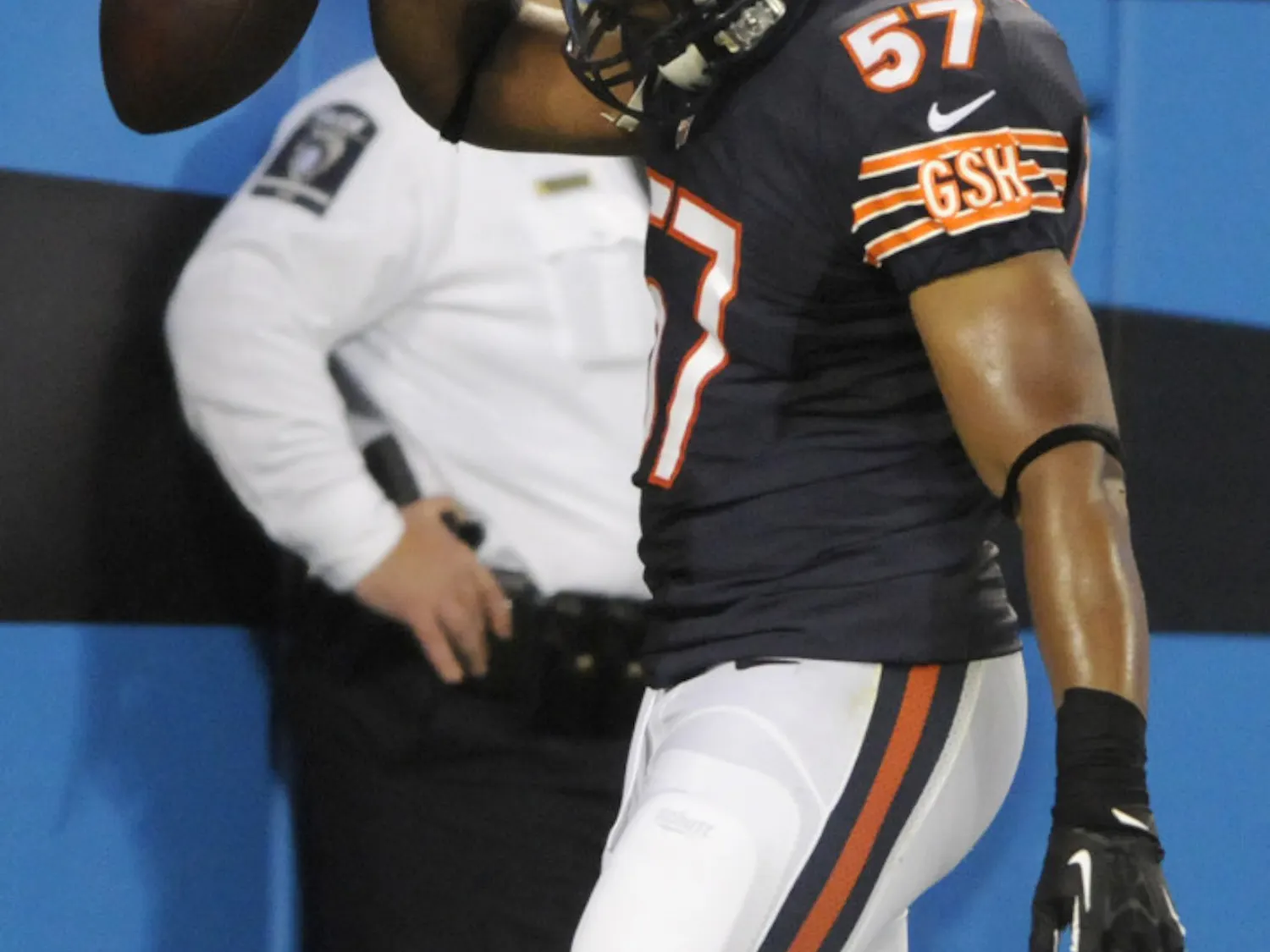 Chicago Bears' Jon Bostic (57) spikes the ball in the end zone after returning an interception for a touchdown against the Carolina Panthers during the first half of a preseason NFL football game in Charlotte, N.C., on Aug. 9.