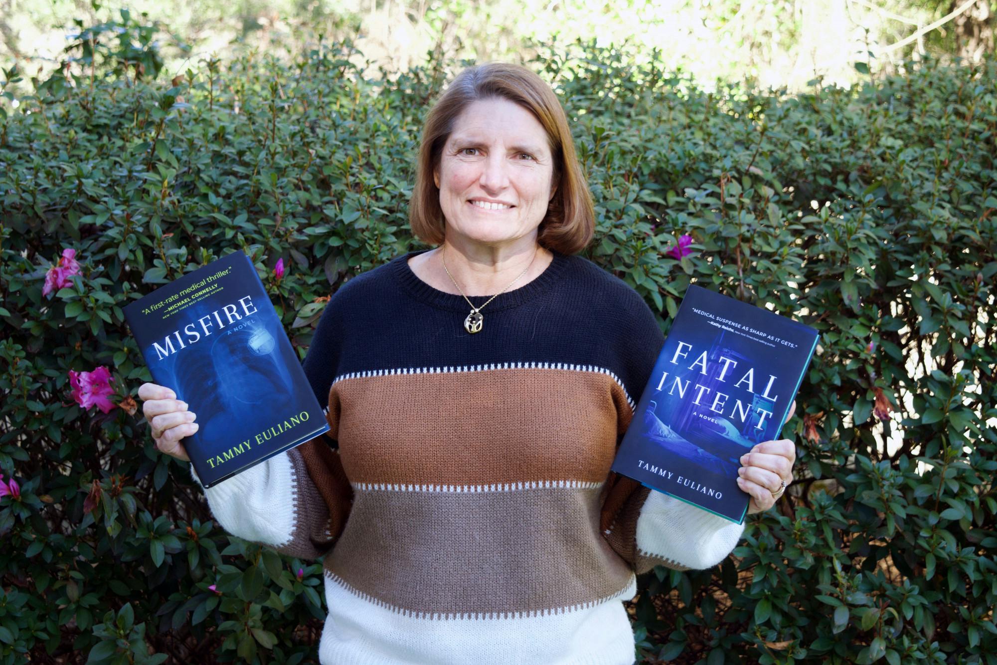 Author and anesthesiologist Dr. Euliano holds her books &quot;Fatal Intent&quot; and &quot;Misfire,&quot; the newest of the Kate Downey medical mystery Monday, Jan. 16, 2023. 