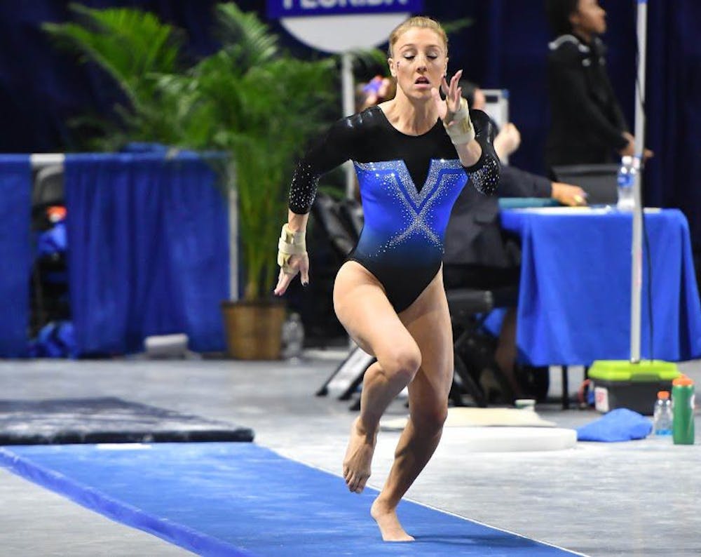 <p>UF gymnast Alex McMurtry sprints during a routine in Florida's win against Missouri on Feb. 24, 2017, in the O'Connell Center.</p>