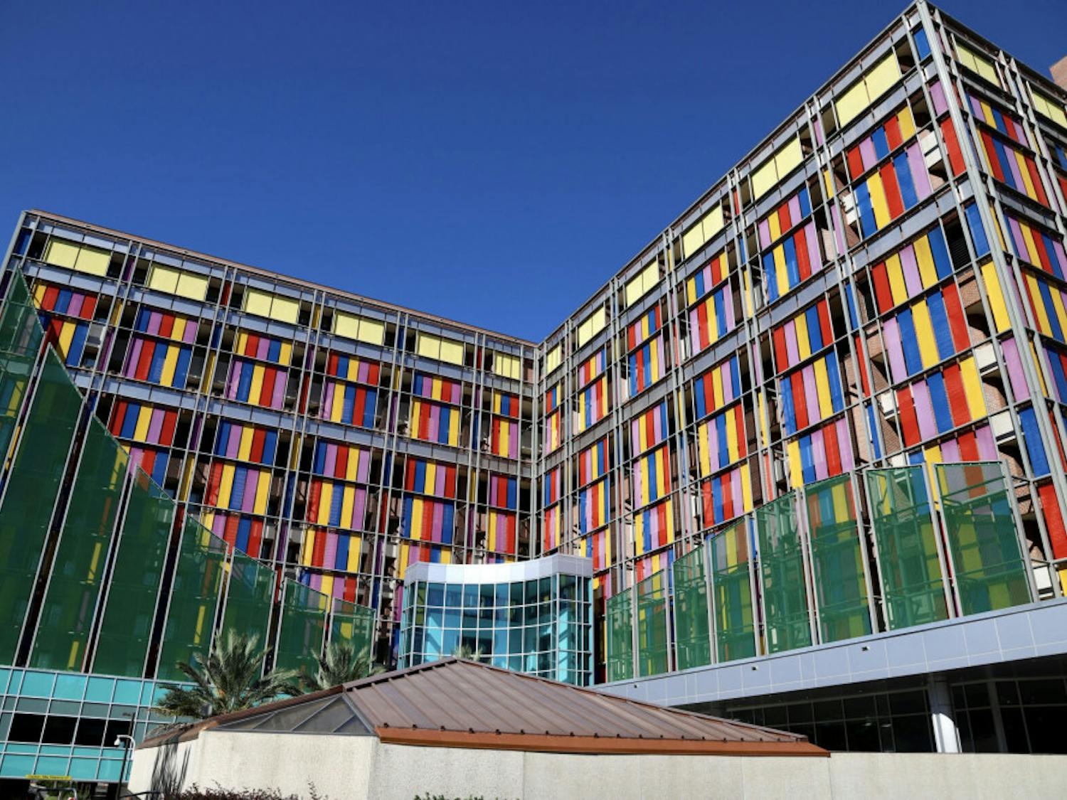 The multi-colored glass of the UF Health Shands Children’s Hospital shines as the sun reflects off the panes on September 25, 2020. The pediatric staff provide care in more than 20 specialties including pediatric hematology-oncology.