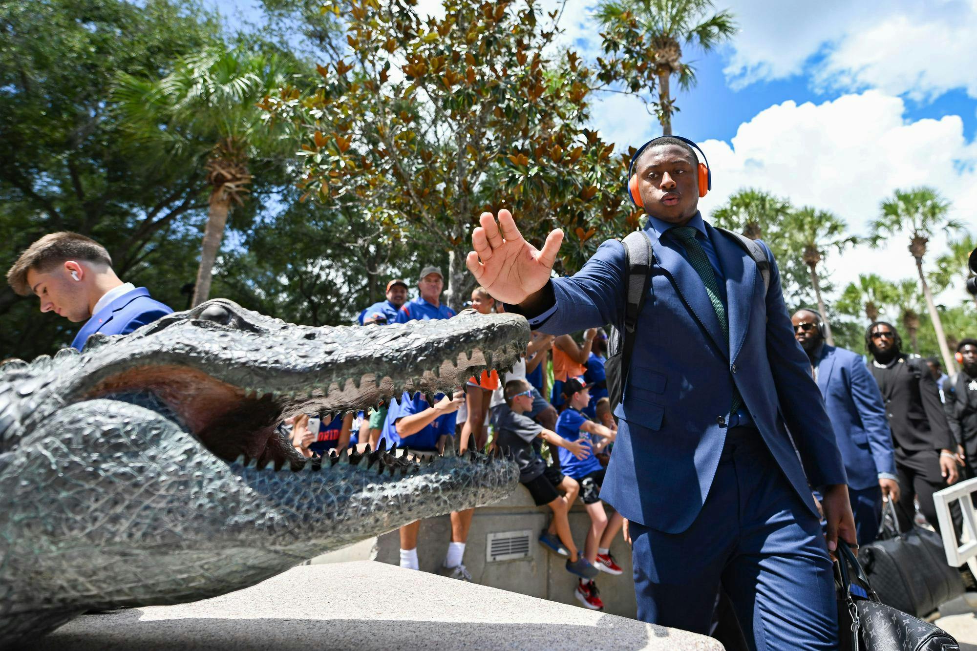 Florida Gators quarterback DJ Lagway (2) touches the gator at the end of Gatorwalk before a football game between the South Florida Bulls and the Florida Gators on Sept. 6, 2025, at Ben Hill Griffin Stadium in Gainesville, Fla.