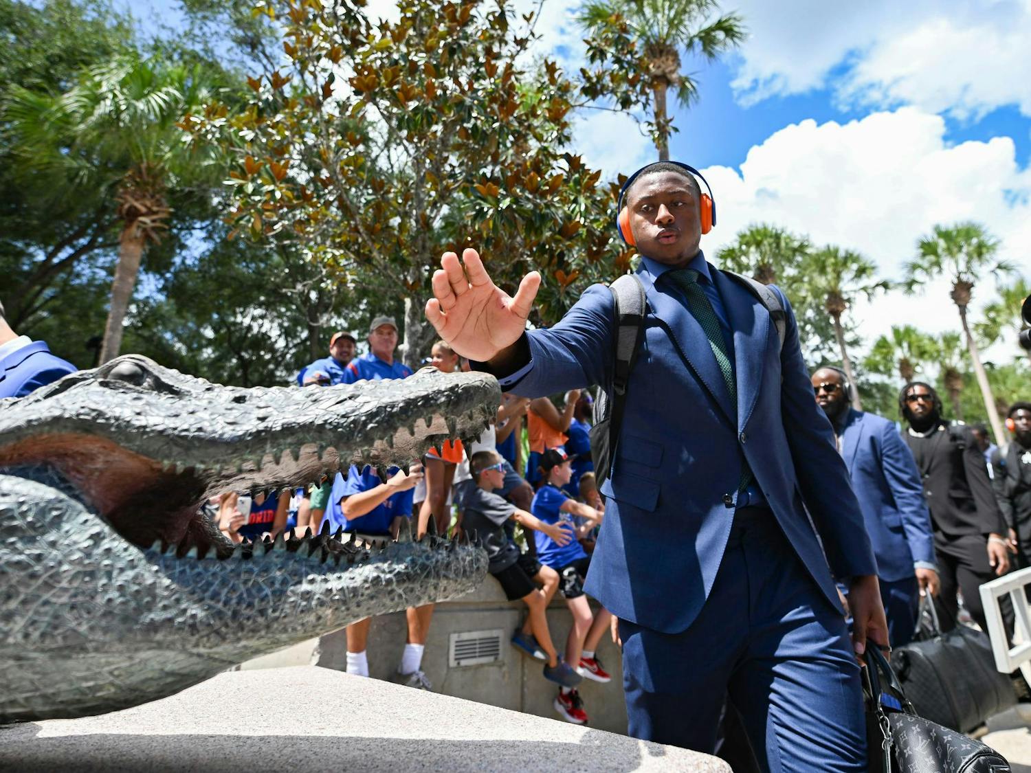 Florida Gators quarterback DJ Lagway (2) touches the gator at the end of Gatorwalk before a football game between the South Florida Bulls and the Florida Gators on Sept. 6, 2025, at Ben Hill Griffin Stadium in Gainesville, Fla.