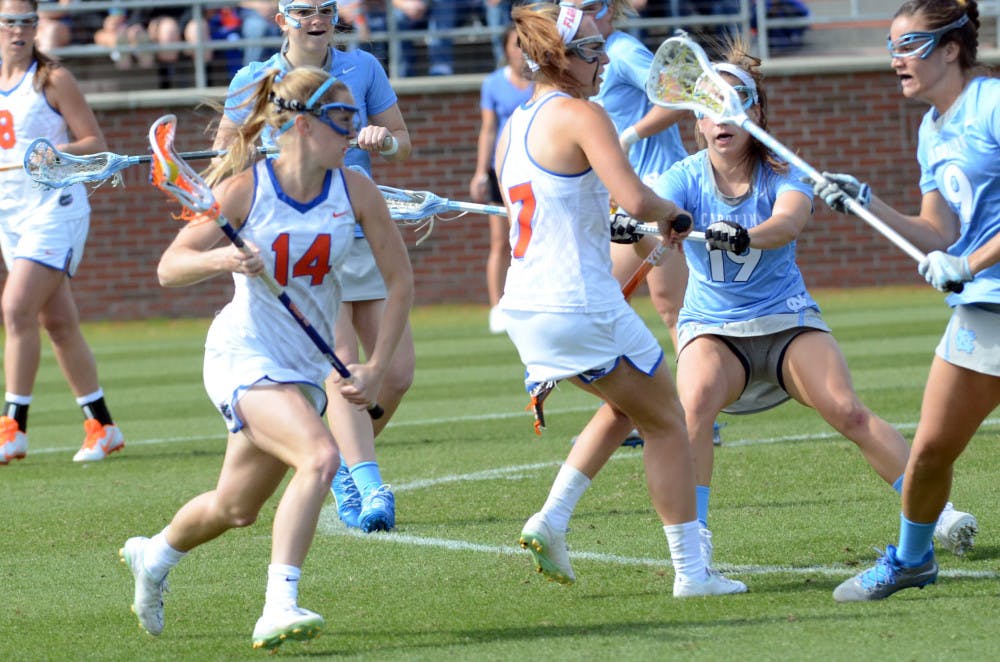Nora Barry runs toward the net during Florida's loss to North Carolina.