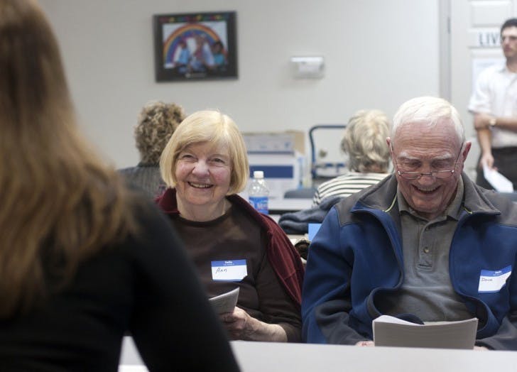 Ann and Doug Bonneville, 76 and 80, respectively, laugh during a Living with Hearing Loss class Monday at the United Way of North Central Florida.