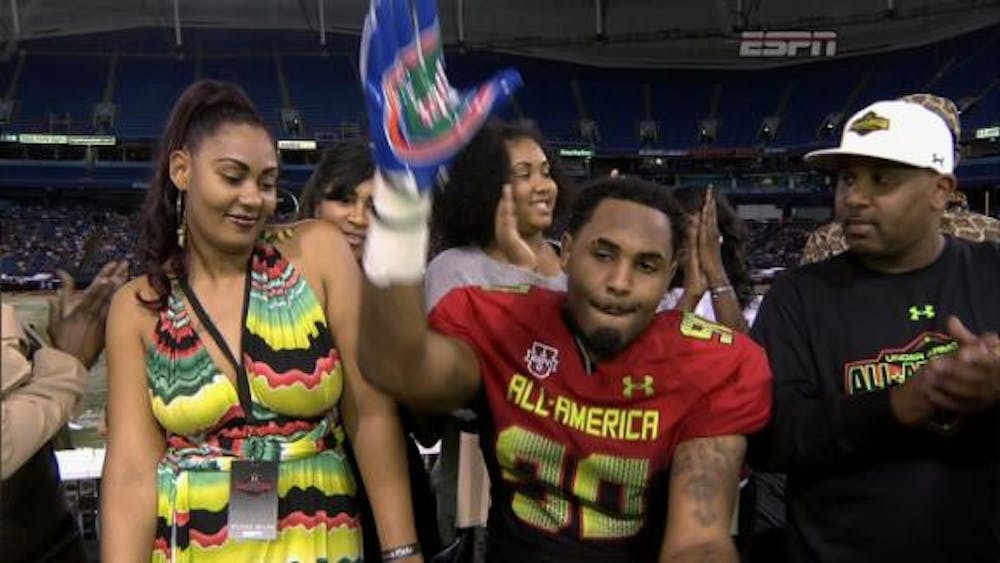 <p>Defensive end Gerald Willis III, a New Orleans native, Gator chomps after picking Florida over LSU at the Under Armour All-America Game on Thursday in St. Petersburg.</p>