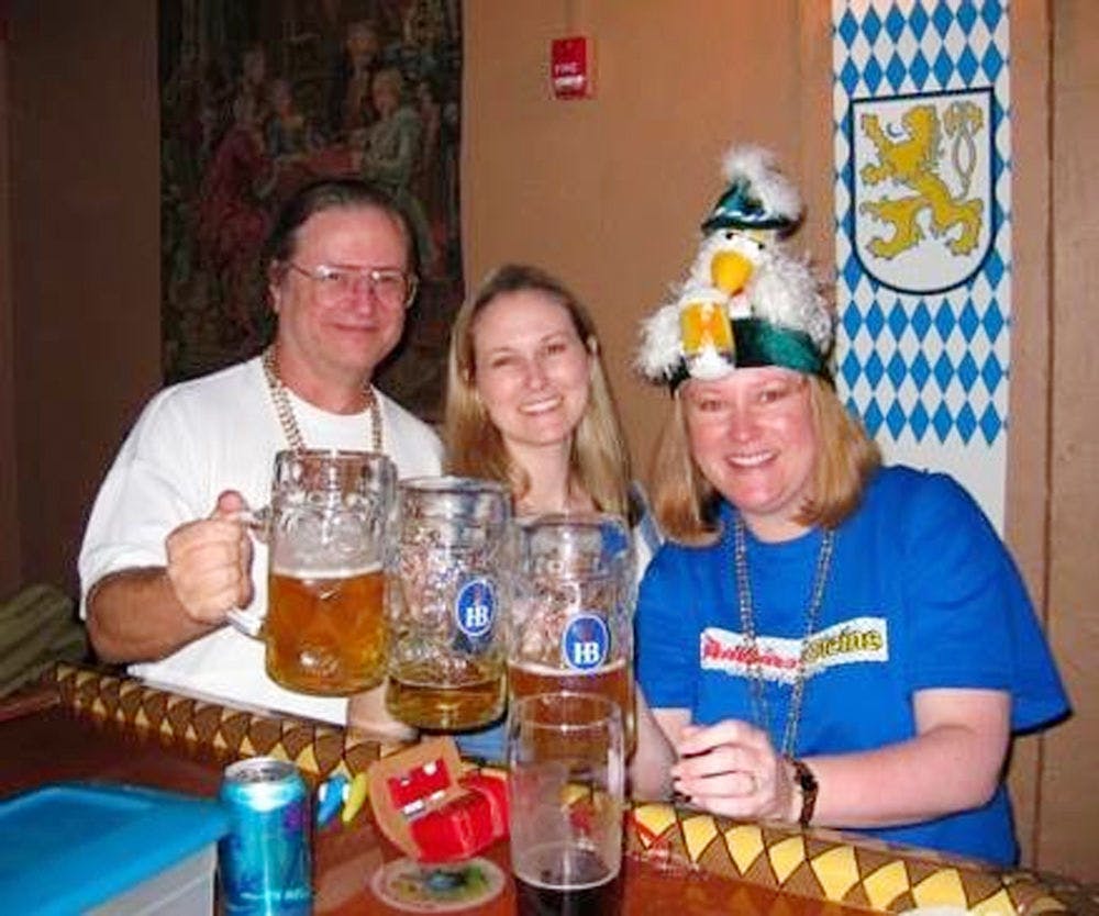Owners Berkeley Hoflund (center) and her late father, Gar Hoflund, celebrate their first Oktoberfest at Stubbies &amp; Steins pub with Berkeley’s older sister, Bryce Hoflund, in 2008.
