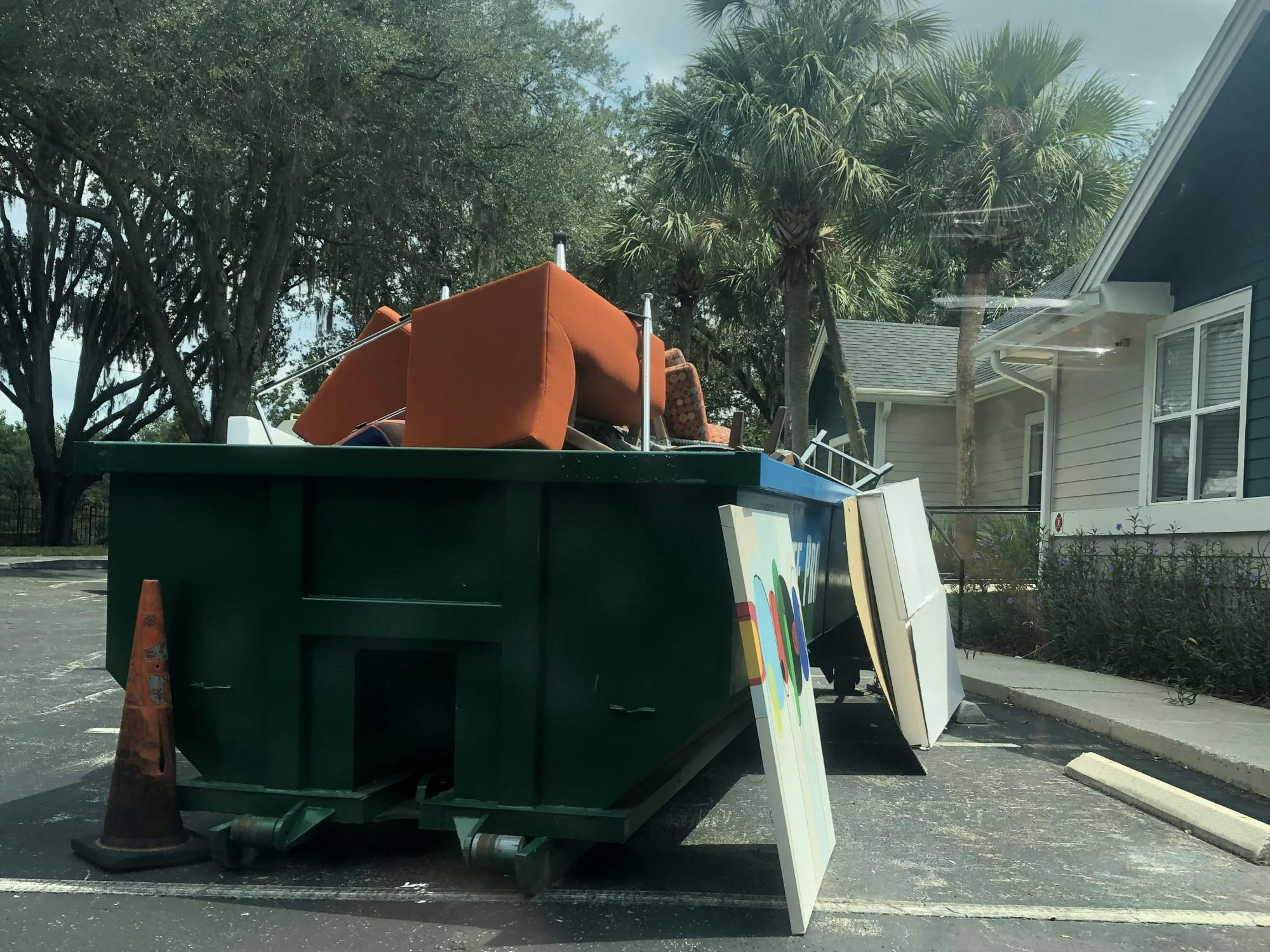 Furniture being thrown out at the Niche apartment complex during remodeling Aug. 18, 2022. 