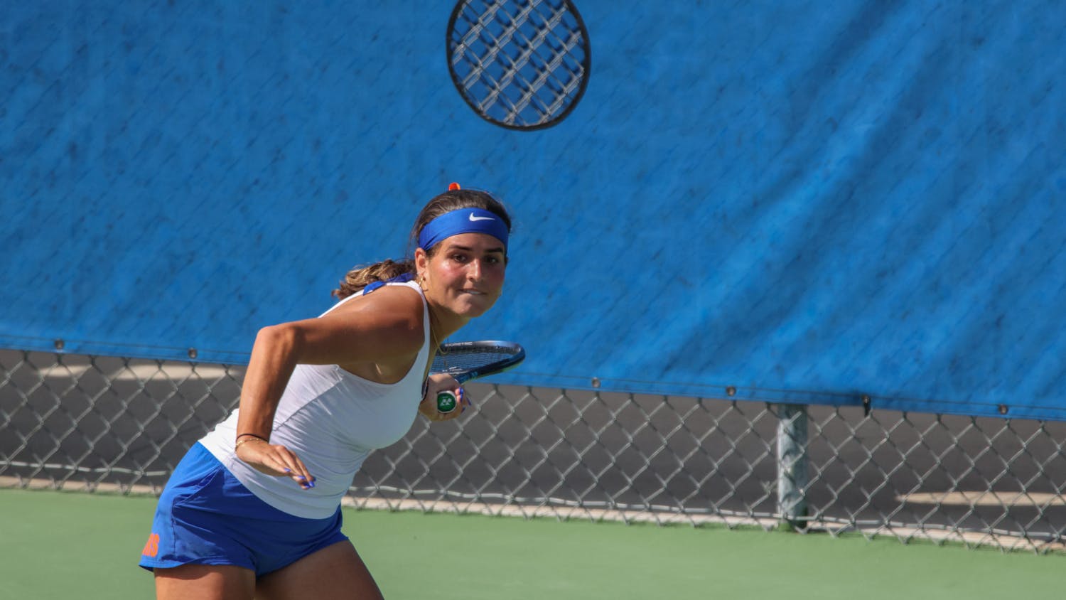 Gators sophomore Emily De Oliveira prepares to hit the ball in a 4-1 victory against the Michigan Wolverines Wednesday, March 22, 2023.