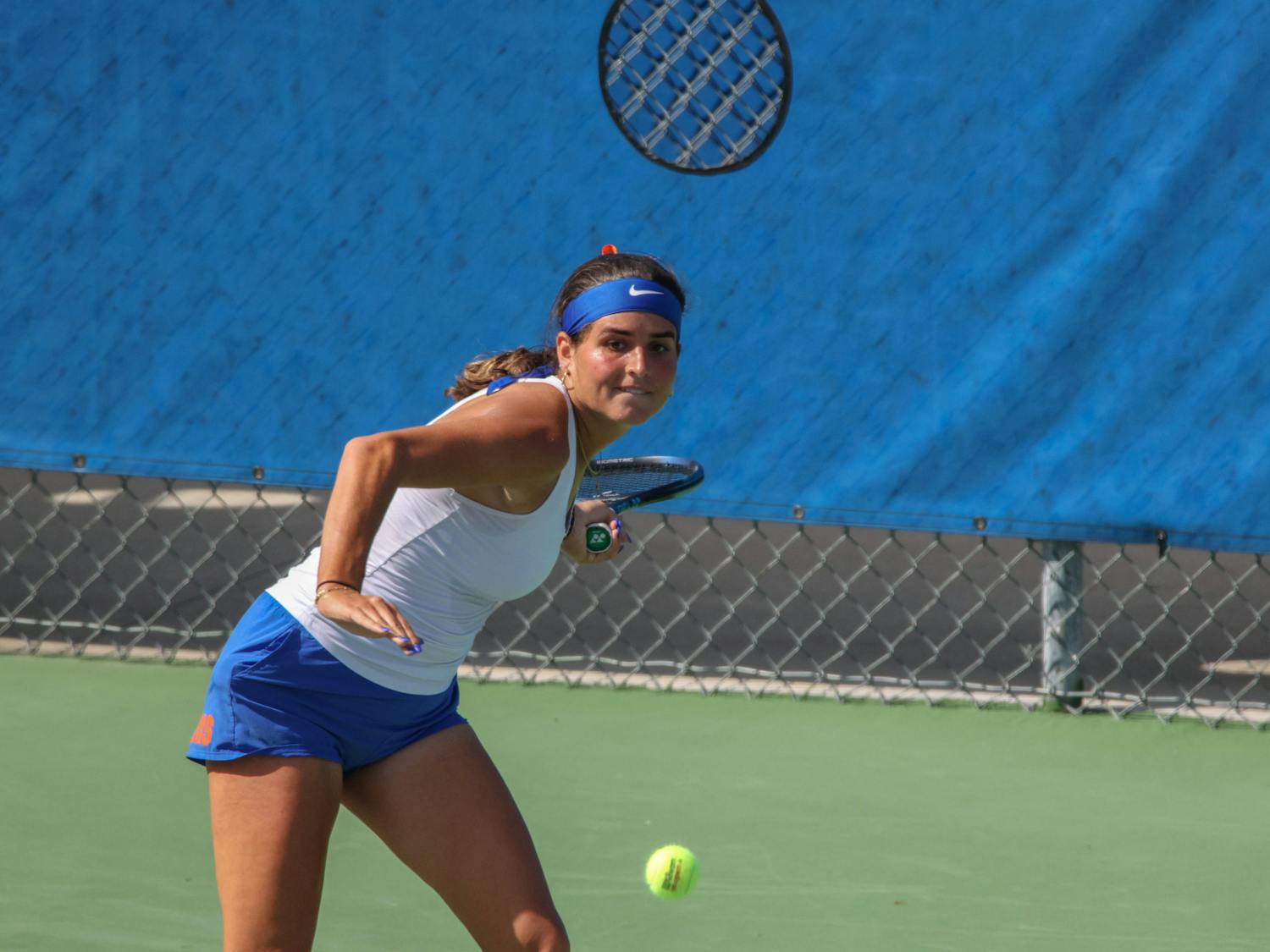 Gators sophomore Emily De Oliveira prepares to hit the ball in a 4-1 victory against the Michigan Wolverines Wednesday, March 22, 2023.