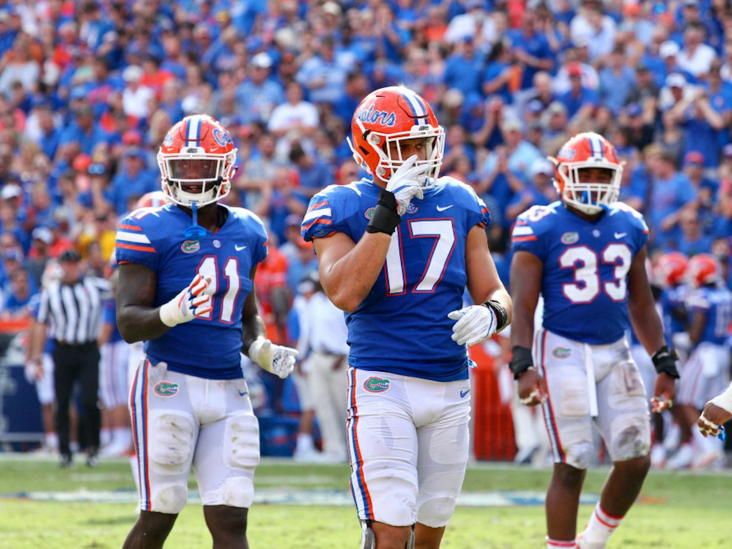 Vosean Joseph (left), Jordan Sherit (middle) and David Reese get ready on defense during Florida's 17-16 loss against LSU on Saturday at Ben Hill Griffin Stadium.