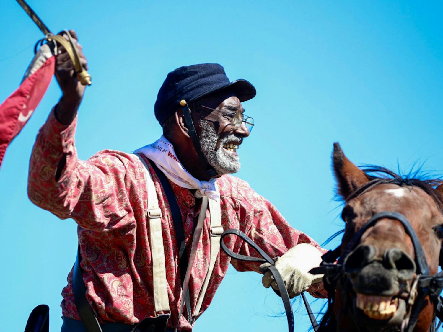 Civil War re-enactor and Vietnam War veteran Walter Anderson, 69, rides his horse, Sonney Boy, during the re-enactment. "History, don't get it twisted," Anderson said atop his horse after acting as a cavalry member for the Confederate side. "That's why I do what I do, so history can get untwisted."