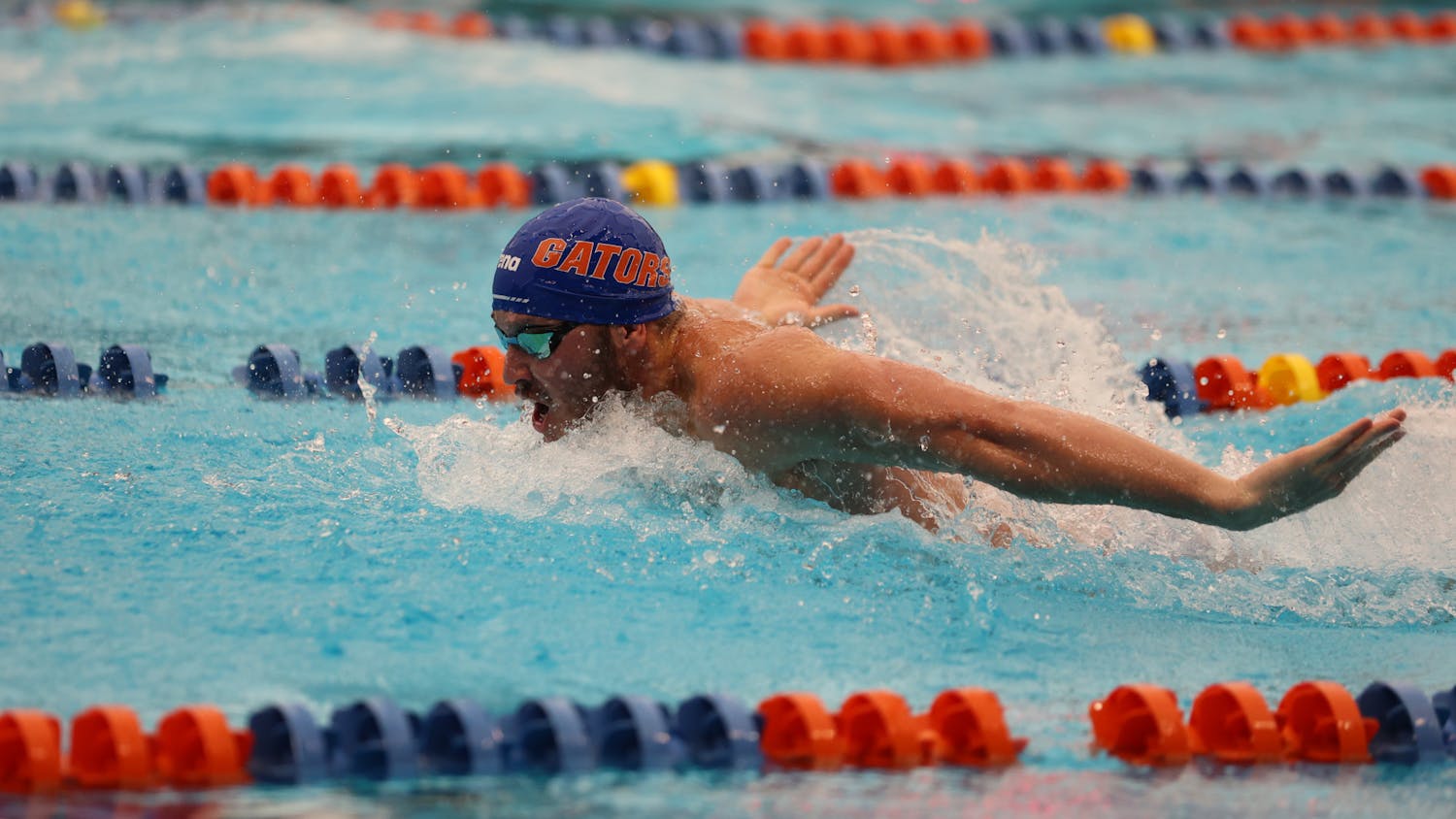  Senior Amro Al-Wir competes during the Gators' meet against the Virginia Cavaliers on Friday, October 13, 2023, at the Stephen C. O'Connell Center Natatorium in Gainesville, Florida.