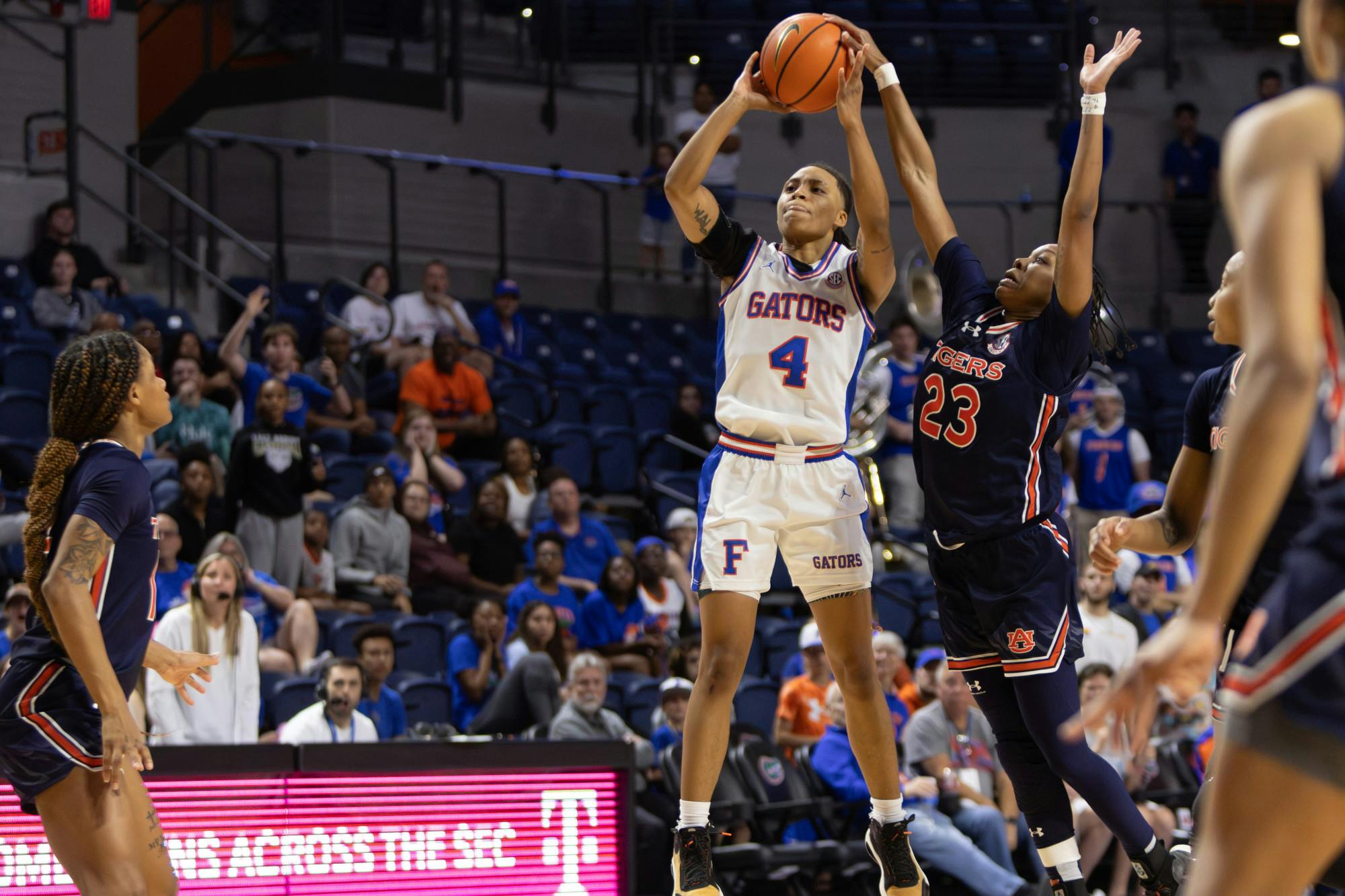 Senior Zippy Broughton attempts a shot against an Auburn defender in the Gators' 77-74 loss against the Tigers, Sunday, March 3, 2024. 