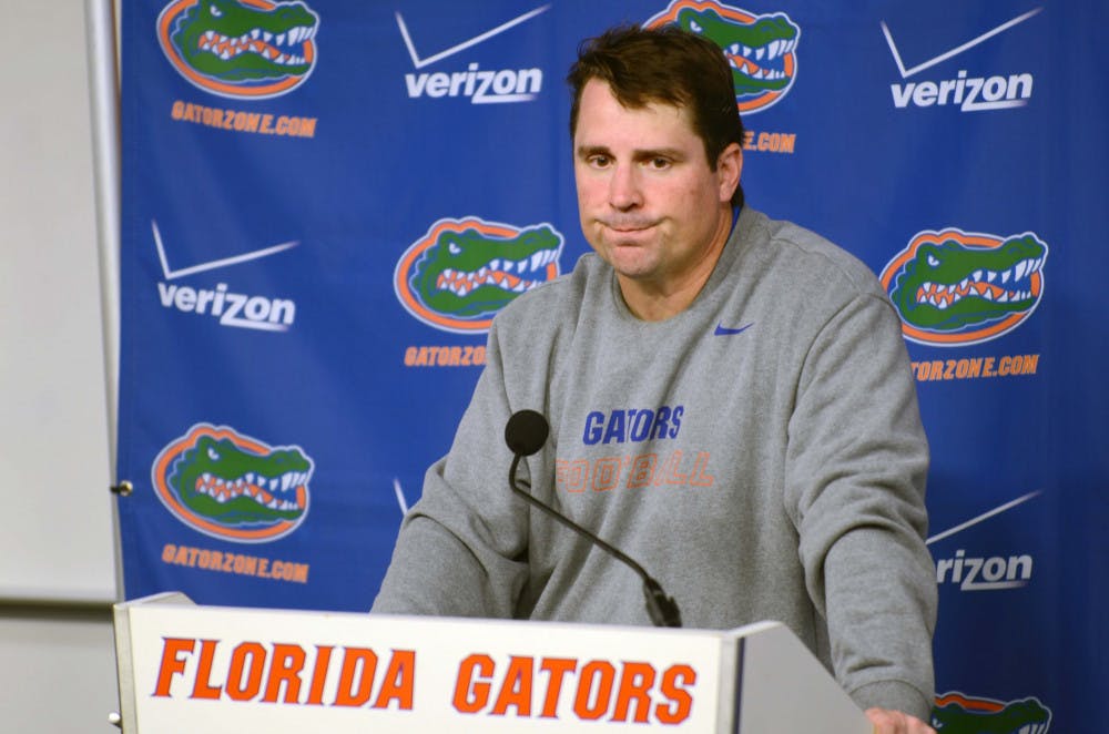 <p>UF coach Will Muschamp speaks to reporters following Florida's 23-20 overtime loss against South Carolina on Saturday.</p>