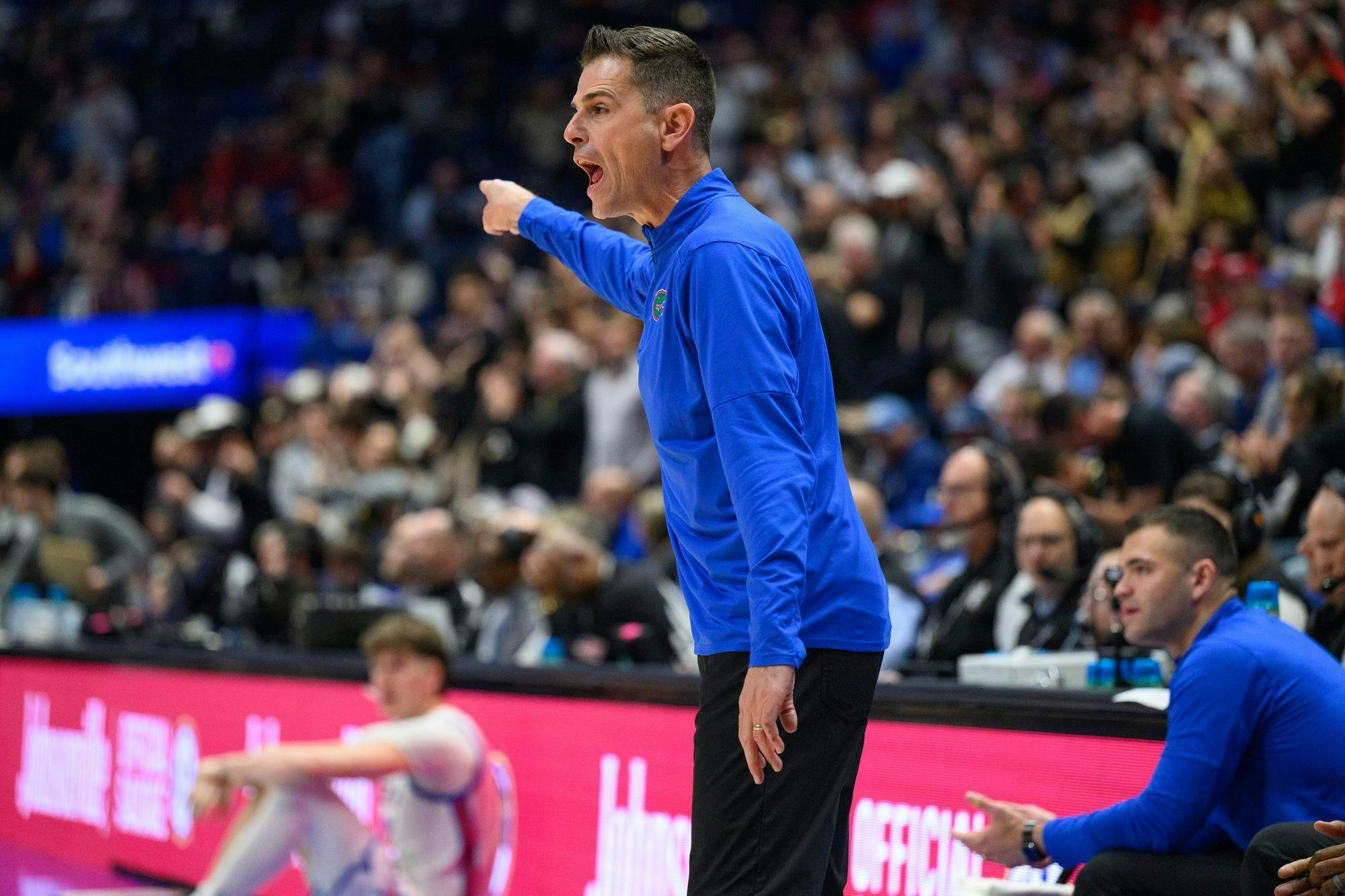 Florida head coach Todd Golden yells during the second half of an SEC Men's Basketball Tournament semifinal game against Vanderbilt, Saturday, March 14, 2026, in Nashville, Tenn.