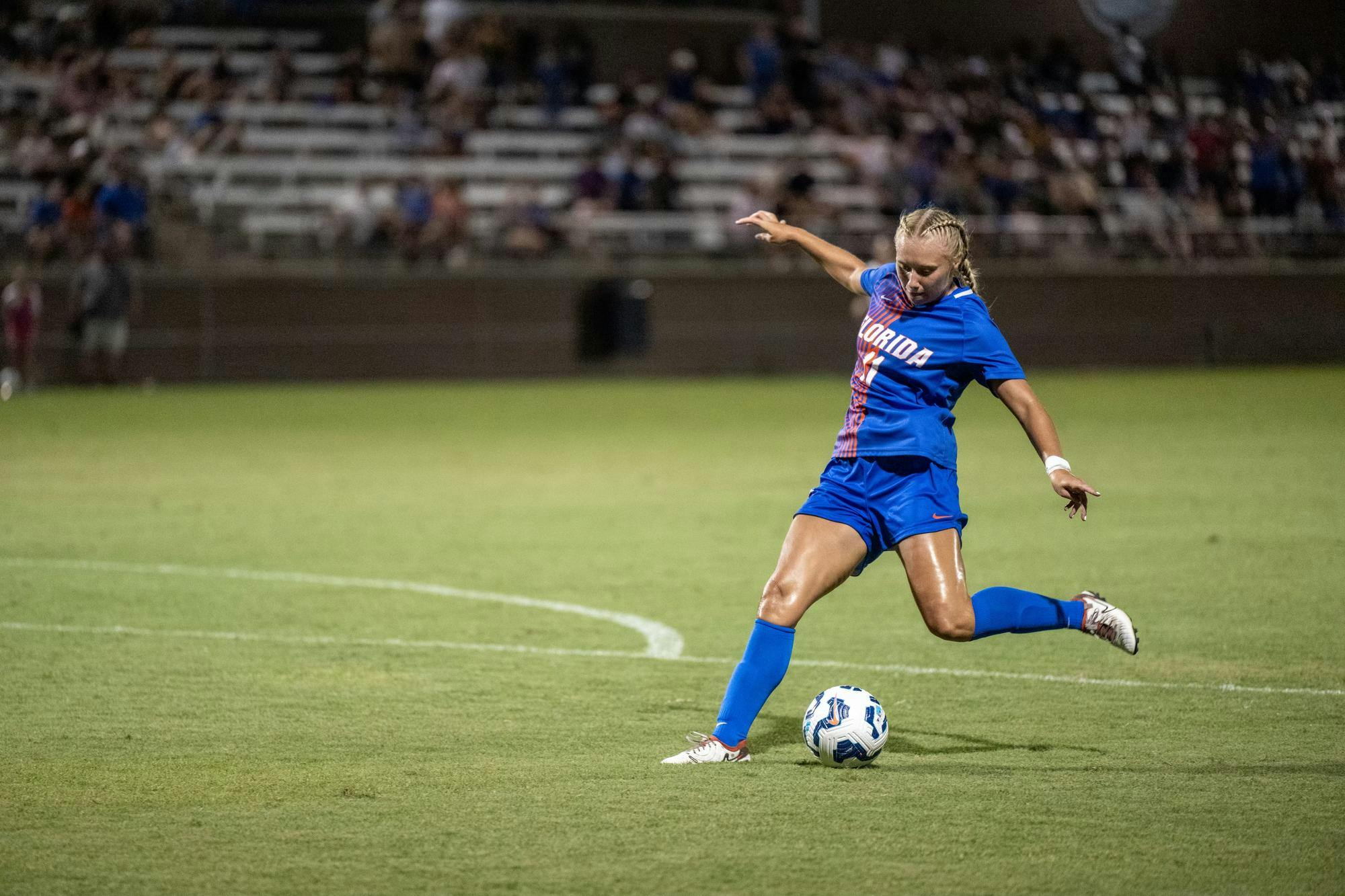Redshirt junior Sophie White shoots the ball in the Gators' 2-2 tie against the UCF Knights on Sunday, Aug. 25.