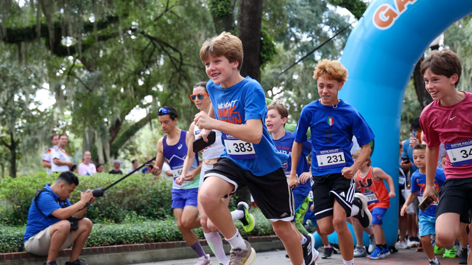 Participants of the 2025 Gator Gallop cross the starting line on Gainesville’s Plaza of the Americas. The Gator Gallop kicked off University of Florida’s Homecoming Weekend on Friday, Oct. 9, 2026.