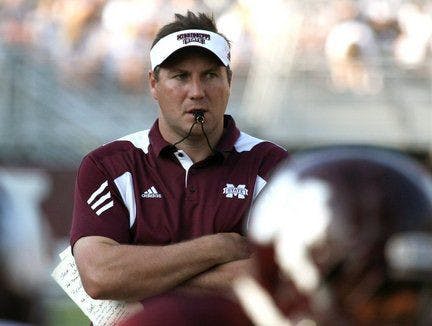 Head coach Dan Mullen observes his team in action during Mississippi State's spring college football game in Starkville, Miss., Saturday April 17, 2010. Maroon Team won 26-13 (AP Photo/Kerry Smith).
