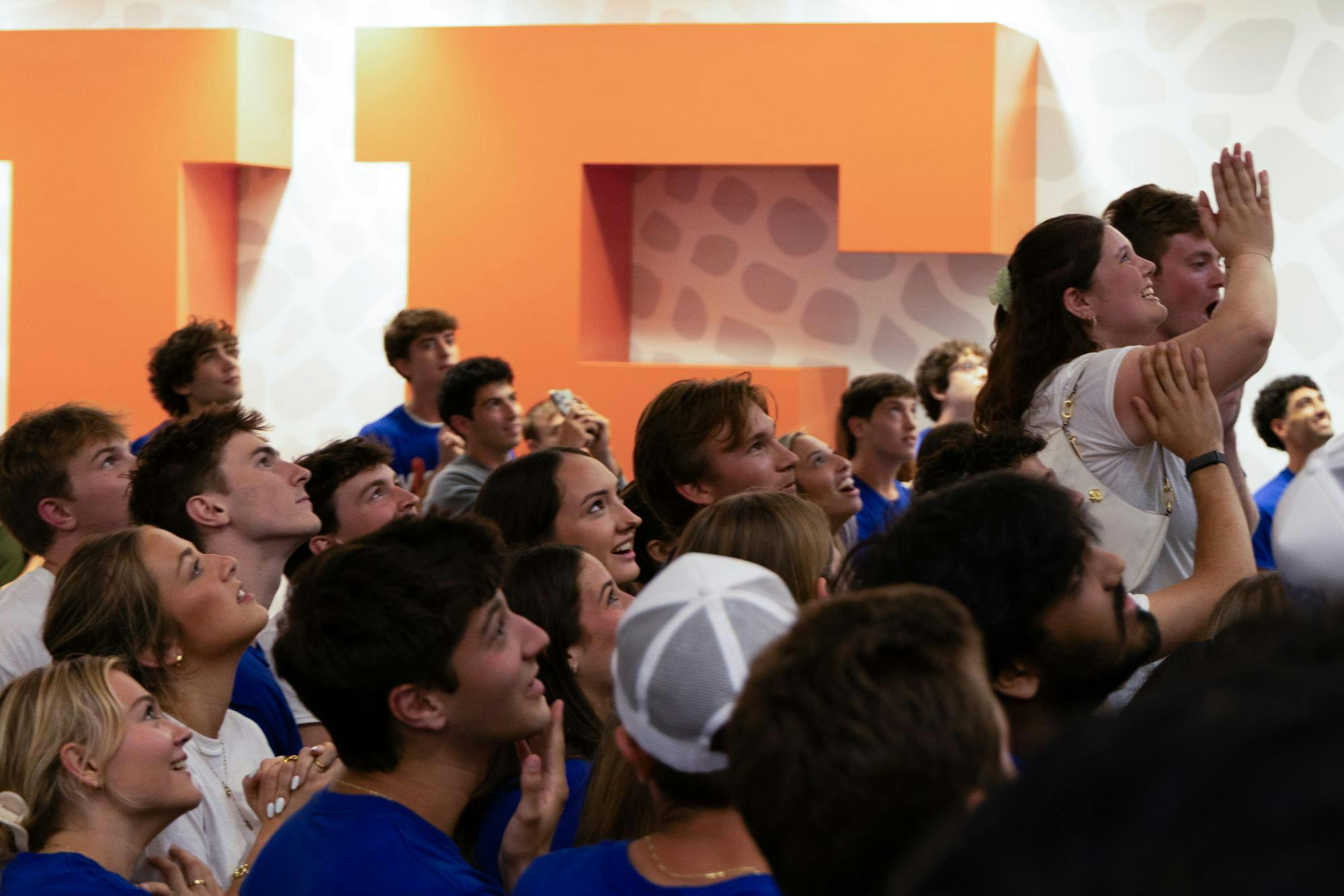 A member of Vision Party stands on an elevated surface to celebrate as student government election results are announced in the Reitz Union on UF's campus, Wednesday, Sept. 30, 2026.