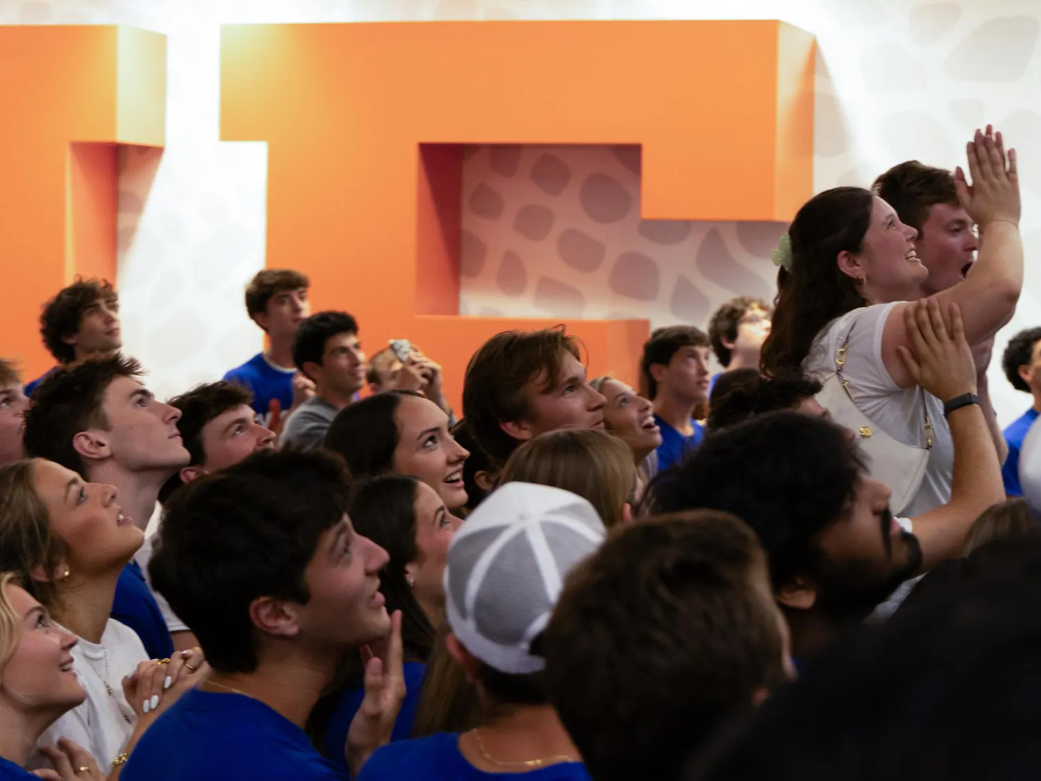 A member of Vision Party stands on an elevated surface and celebrates as student government election results are announced on the first floor of the Reitz Union, Wednesday, Sept. 30, 2026, in Gainesville, Fla.