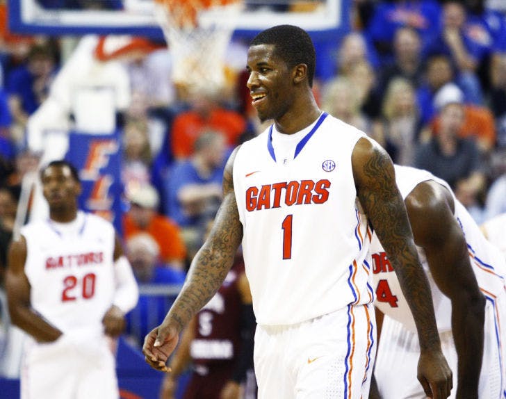 Senior guard Kenny Boynton (1) walks off the court during Florida’s 75-36 victory against South Carolina on Wednesday night in the O’Connell Center. The Gators are the last remaining unbeaten team in Southeastern Conference play.

