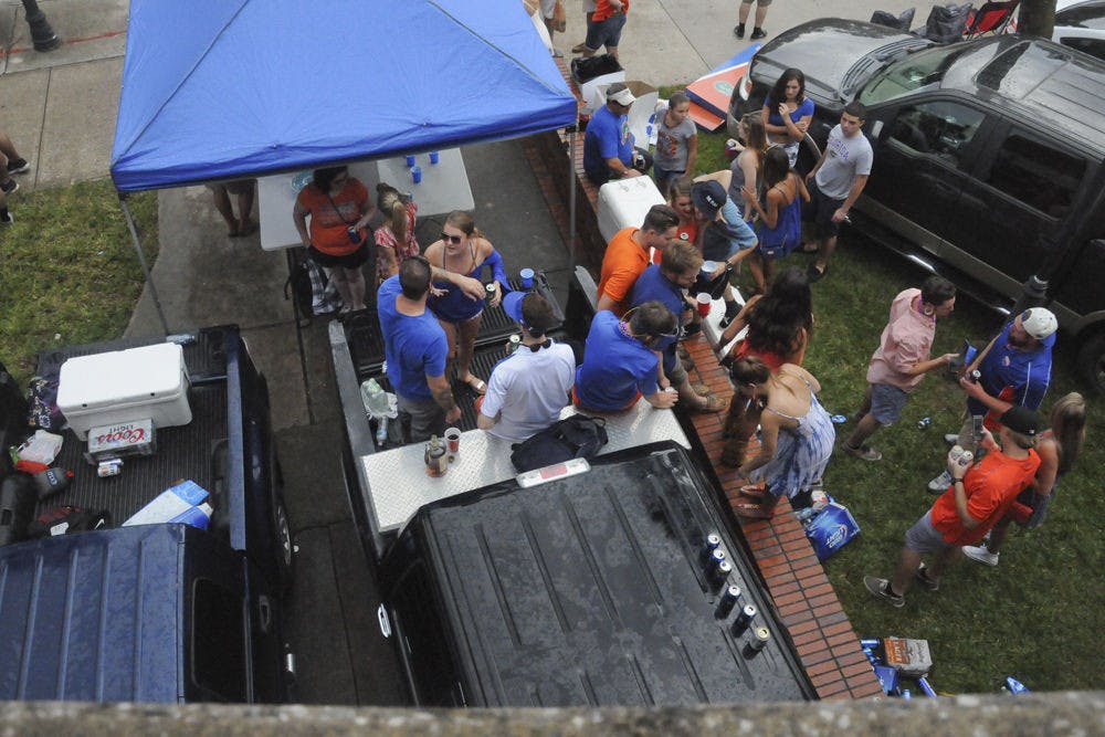 <p>Gator fans tailgate just east of Turlington Plaza before the football game Sept. 5, 2015.</p>